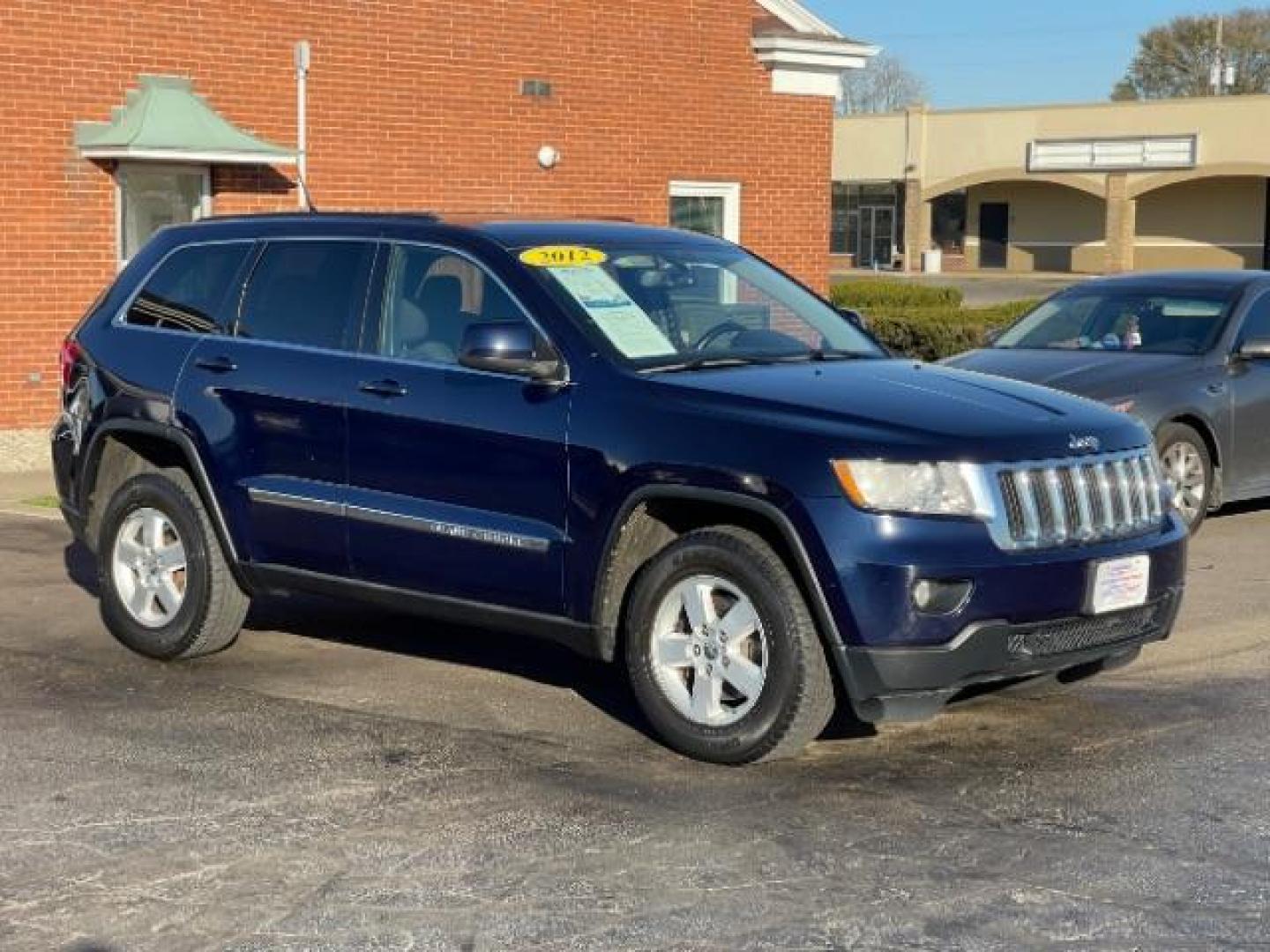 2012 True Blue Pearl Jeep Grand Cherokee Laredo 4WD (1C4RJFAGXCC) with an 3.6L V6 DOHC 24V engine, 5-Speed Automatic transmission, located at 4508 South Dixie Dr, Moraine, OH, 45439, (937) 908-9800, 39.689976, -84.218452 - Photo#0