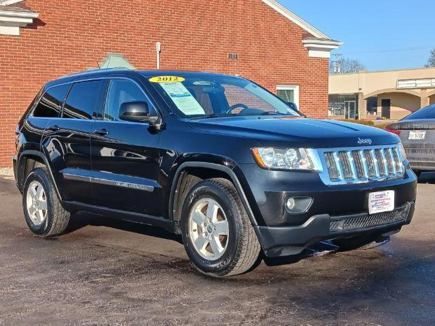 2012 Brilliant Black Crystal Pearl Jeep Grand Cherokee Laredo 4WD (1C4RJFAG1CC) with an 3.6L V6 DOHC 24V engine, 5-Speed Automatic transmission, located at 1099 N County Rd 25A, Troy, OH, 45373, (937) 908-9800, 40.057079, -84.212883 - Photo#0