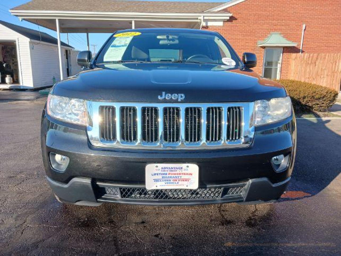 2012 Brilliant Black Crystal Pearl Jeep Grand Cherokee Laredo 4WD (1C4RJFAG1CC) with an 3.6L V6 DOHC 24V engine, 5-Speed Automatic transmission, located at 1099 N County Rd 25A, Troy, OH, 45373, (937) 908-9800, 40.057079, -84.212883 - Photo#1