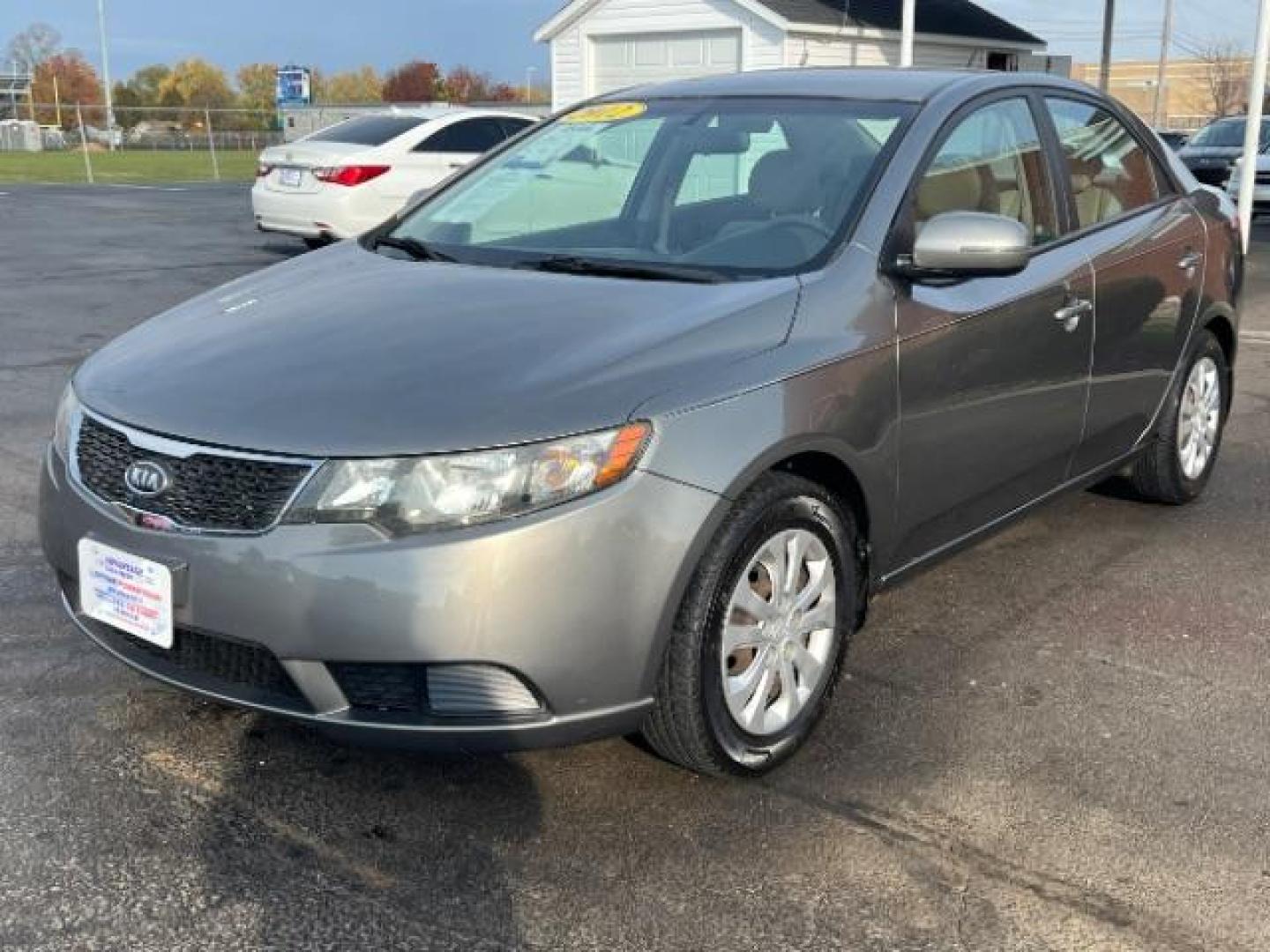 2012 Metal Bronze Metallic Kia Forte EX (KNAFU4A24C5) with an 2.0L L4 DOHC 16V engine, located at 1099 N County Rd 25A, Troy, OH, 45373, (937) 908-9800, 40.057079, -84.212883 - Photo#10