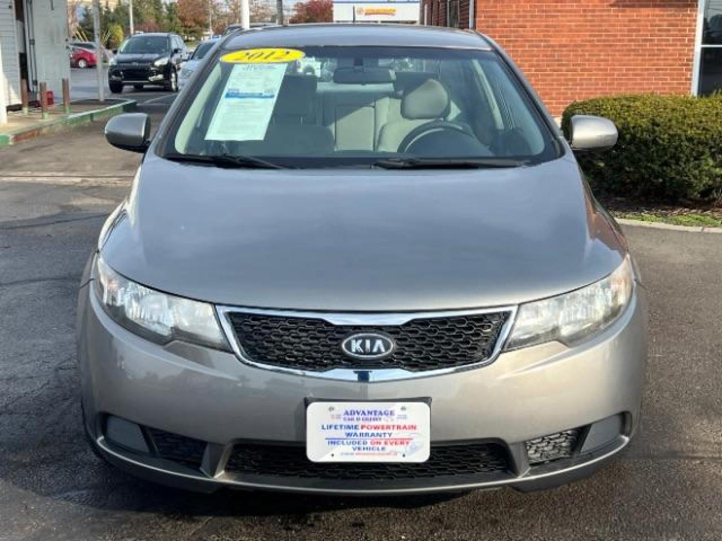 2012 Metal Bronze Metallic Kia Forte EX (KNAFU4A24C5) with an 2.0L L4 DOHC 16V engine, located at 1099 N County Rd 25A, Troy, OH, 45373, (937) 908-9800, 40.057079, -84.212883 - Photo#1