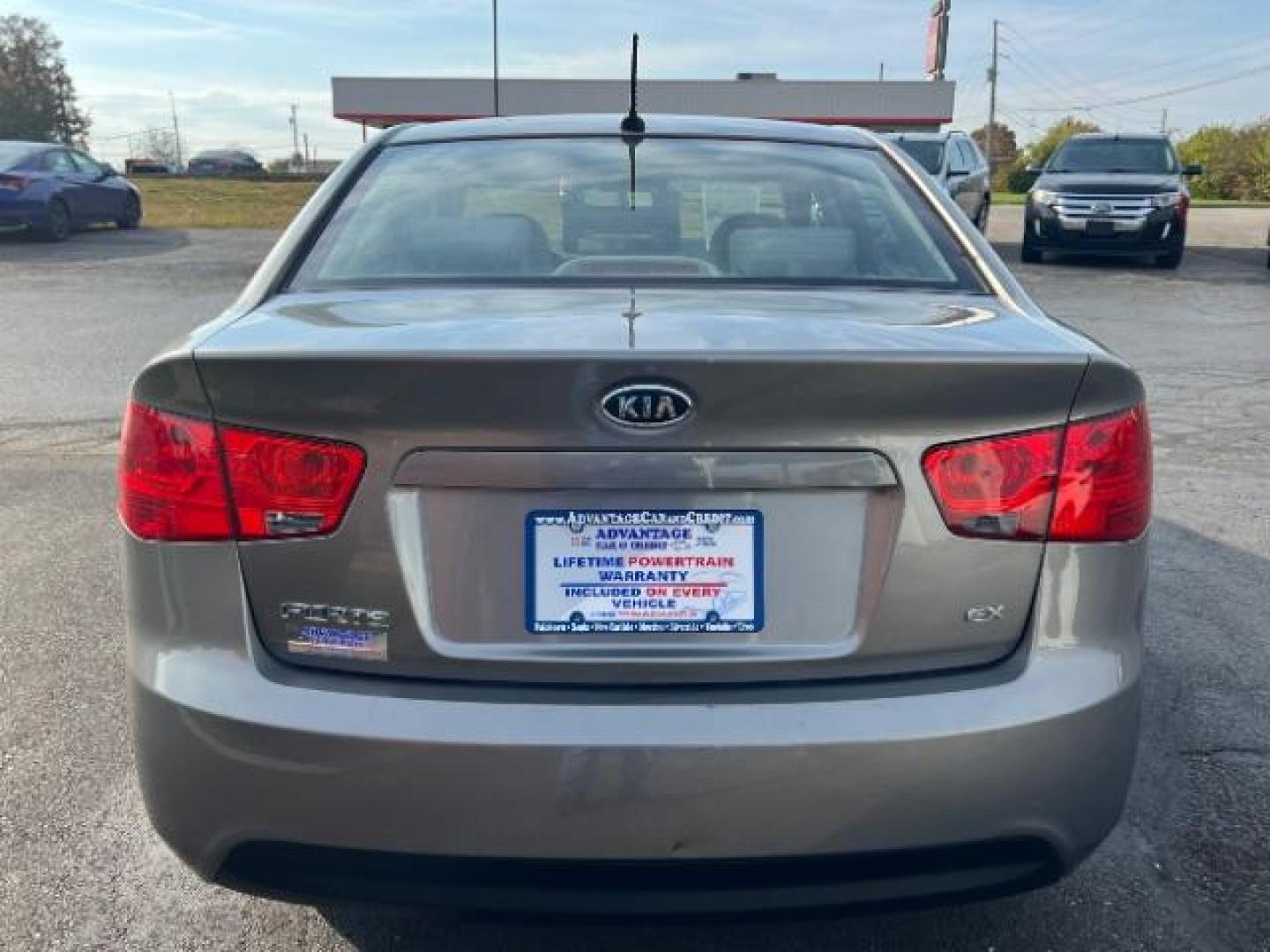 2012 Metal Bronze Metallic Kia Forte EX (KNAFU4A24C5) with an 2.0L L4 DOHC 16V engine, located at 1099 N County Rd 25A, Troy, OH, 45373, (937) 908-9800, 40.057079, -84.212883 - Photo#3