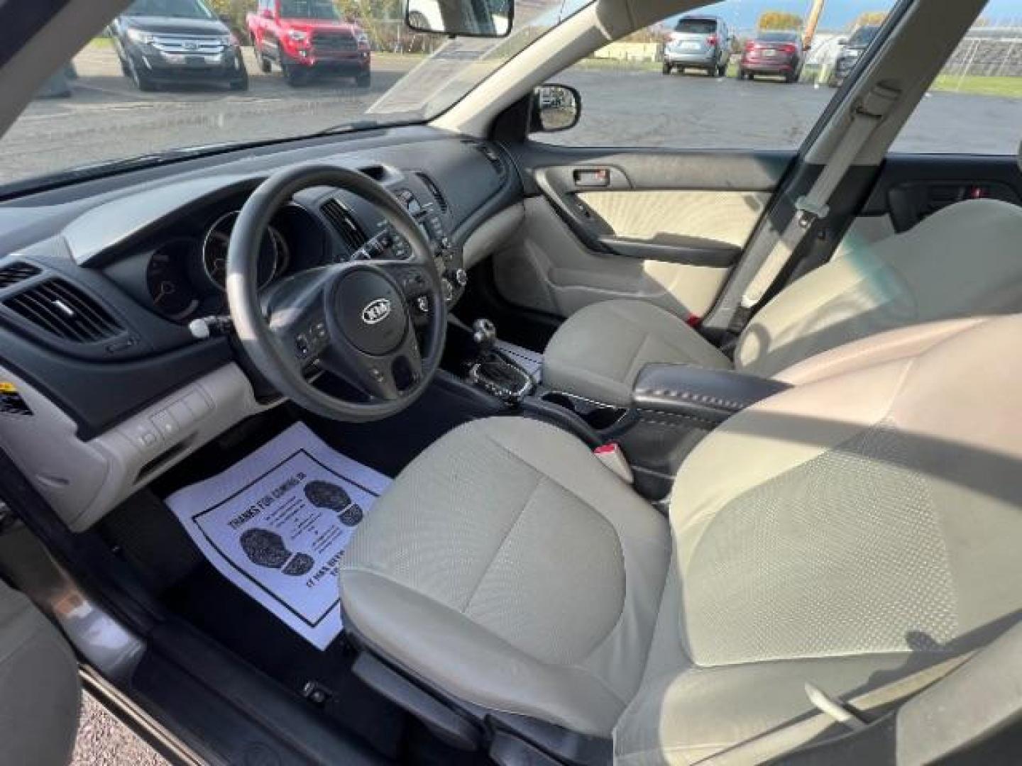 2012 Metal Bronze Metallic Kia Forte EX (KNAFU4A24C5) with an 2.0L L4 DOHC 16V engine, located at 1099 N County Rd 25A, Troy, OH, 45373, (937) 908-9800, 40.057079, -84.212883 - Photo#5