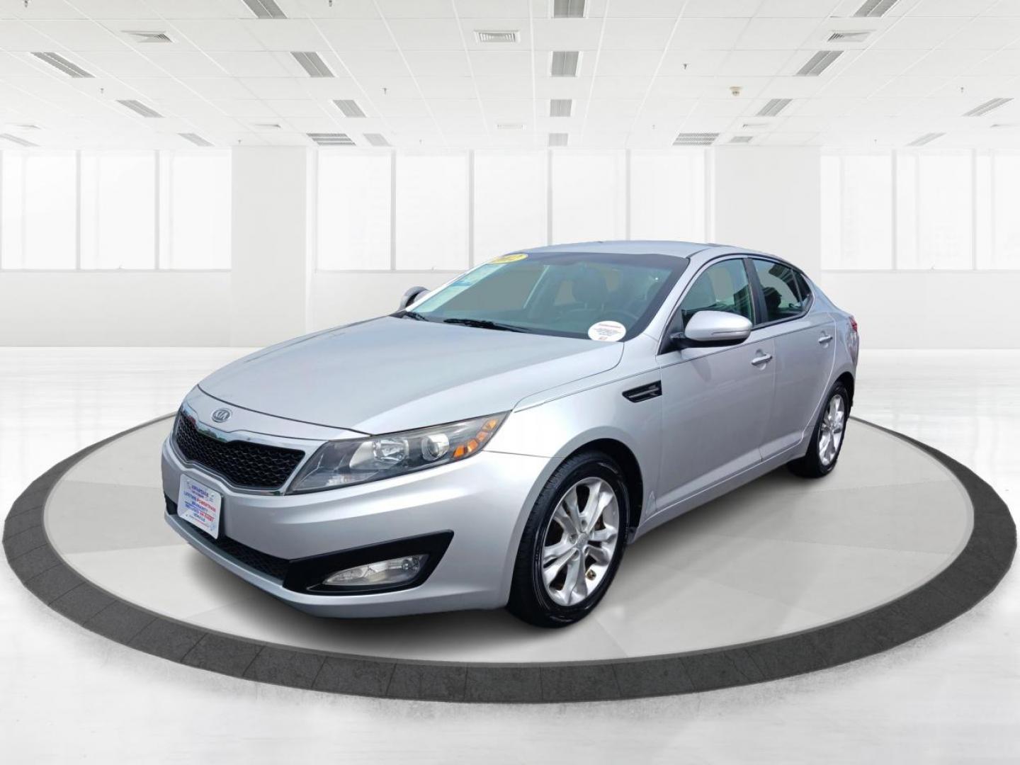 2012 Titanium Metallic Kia Optima EX (5XXGN4A7XCG) with an 2.4L L4 DOHC 16V engine, 6-Speed Automatic transmission, located at 4508 South Dixie Dr, Moraine, OH, 45439, (937) 908-9800, 39.689976, -84.218452 - Photo#7