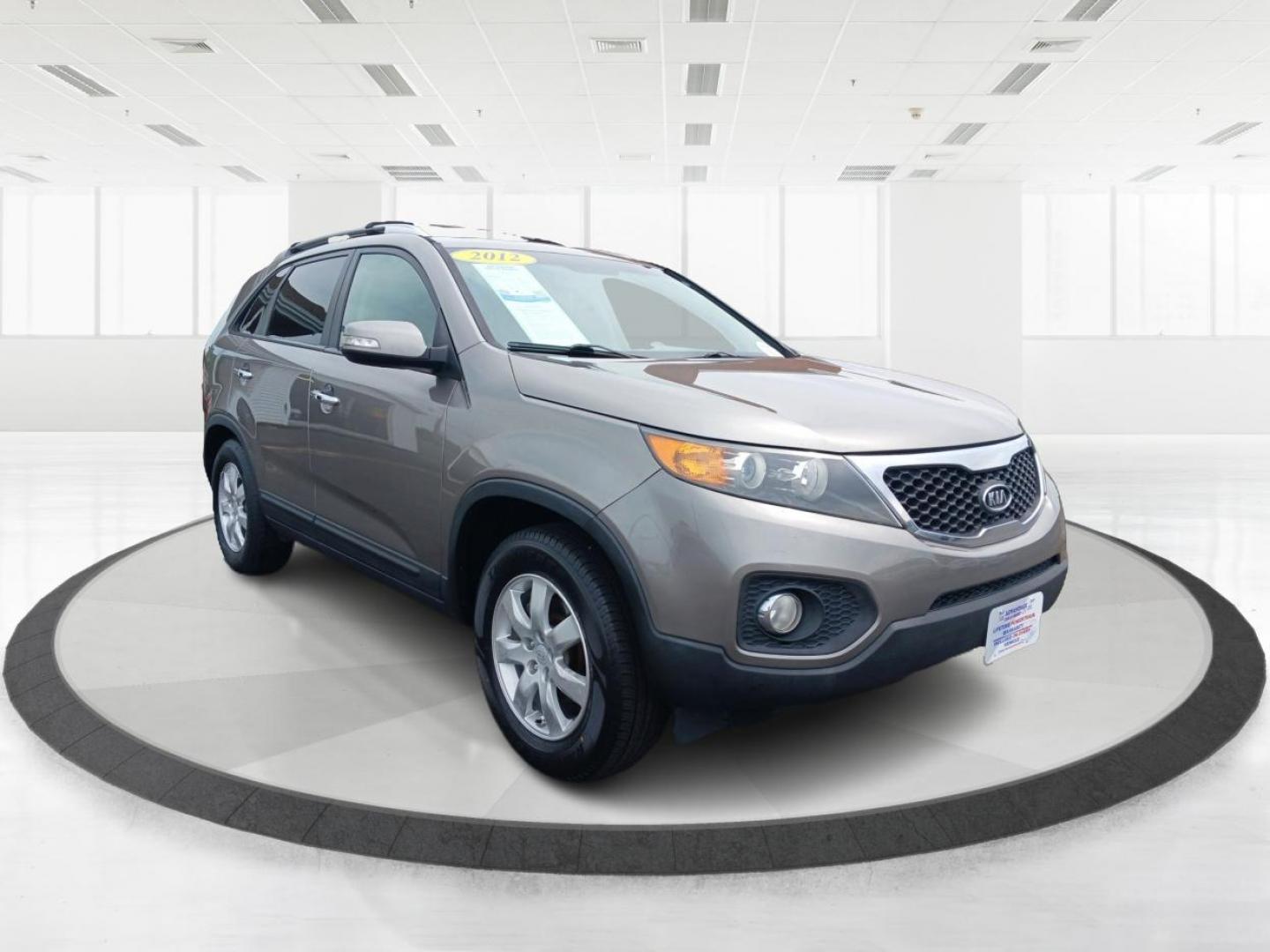 2012 Satin Metal Kia Sorento LX 2WD (5XYKT4A60CG) with an 2.4L L4 DOHC 16V engine, 6-Speed Automatic transmission, located at 401 Woodman Dr, Riverside, OH, 45431, (937) 908-9800, 39.760899, -84.123421 - Photo#0