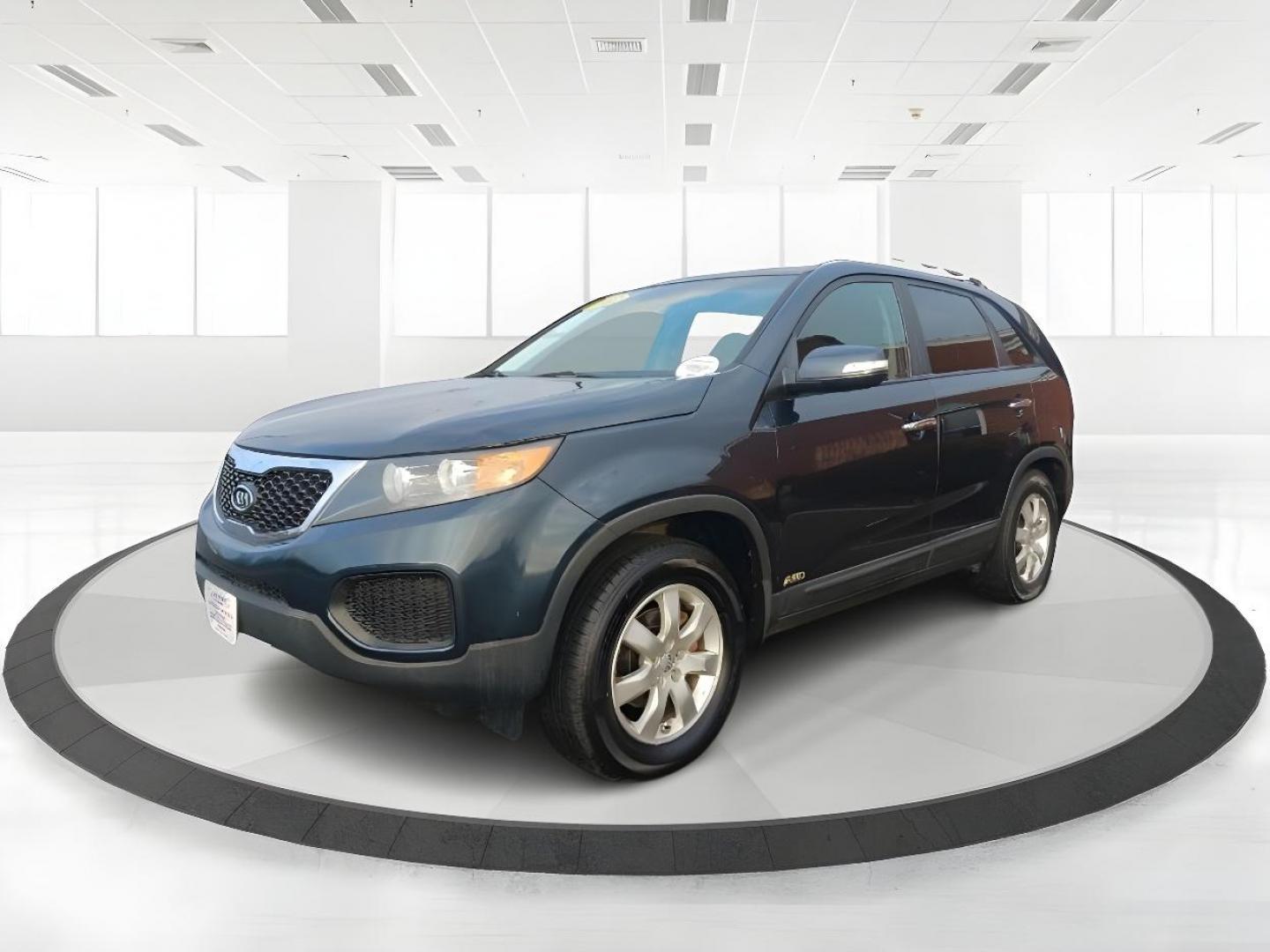 2012 Pacific Blue Kia Sorento LX 4WD (5XYKTDA2XCG) with an 3.5L V6 DOHC 24V engine, 6-Speed Automatic transmission, located at 1184 Kauffman Ave, Fairborn, OH, 45324, (937) 908-9800, 39.807072, -84.030914 - Photo#5