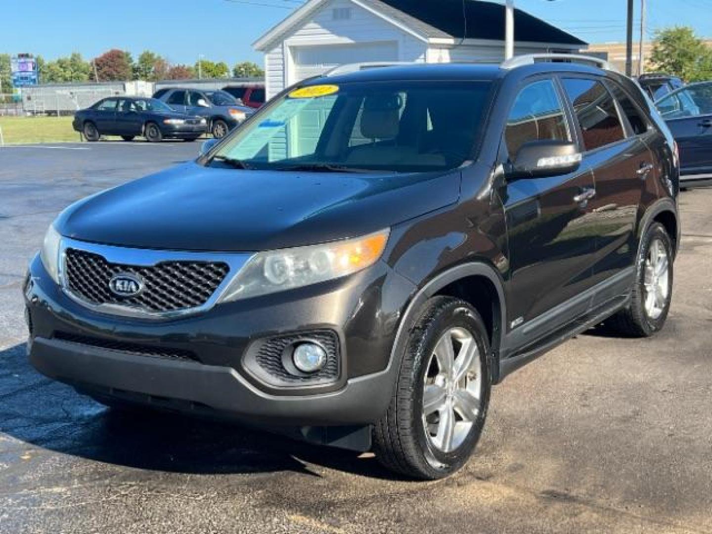 2012 Java Brown Kia Sorento EX 4WD (5XYKUDA68CG) with an 2.4L L4 DOHC 16V engine, 6-Speed Automatic transmission, located at 4508 South Dixie Dr, Moraine, OH, 45439, (937) 908-9800, 39.689976, -84.218452 - Photo#2