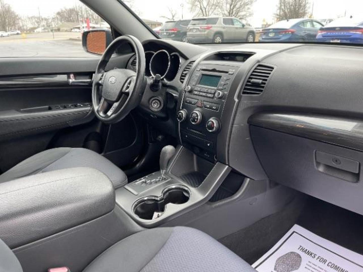 2012 Ebony Black Kia Sorento LX 4WD (5XYKTCA62CG) with an 2.4L L4 DOHC 16V engine, 6-Speed Automatic transmission, located at 880 E. National Road, Vandalia, OH, 45377, (937) 908-9800, 39.891918, -84.183594 - Photo#8