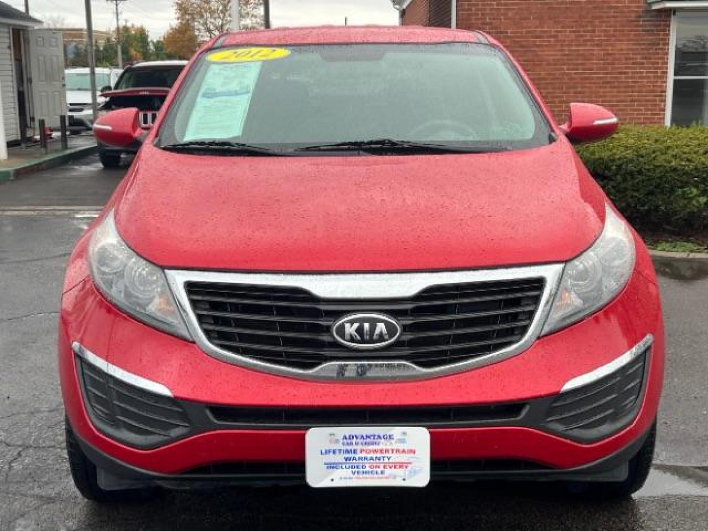 2012 Signal Red Metallic Kia Sportage LX AWD (KNDPBCA27C7) with an 2.4L V6 DOHC 24V engine, 6-Speed Automatic transmission, located at 1230 East Main St, Xenia, OH, 45385, (937) 908-9800, 39.688026, -83.910172 - Photo#1