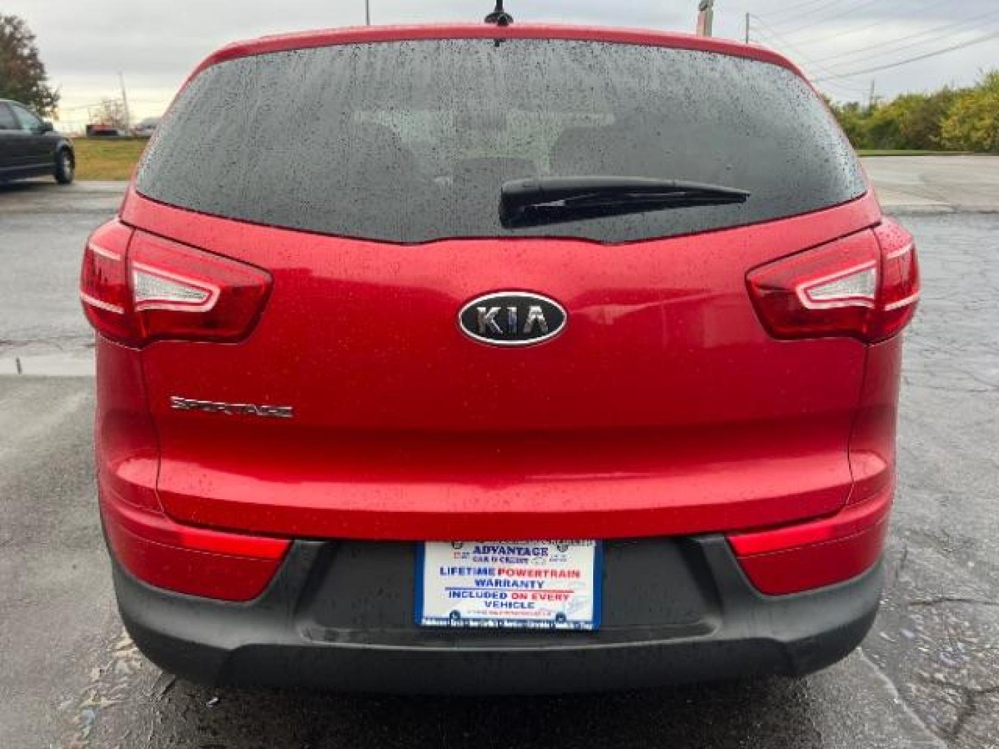 2012 Signal Red Metallic Kia Sportage LX AWD (KNDPBCA27C7) with an 2.4L V6 DOHC 24V engine, 6-Speed Automatic transmission, located at 1230 East Main St, Xenia, OH, 45385, (937) 908-9800, 39.688026, -83.910172 - Photo#4