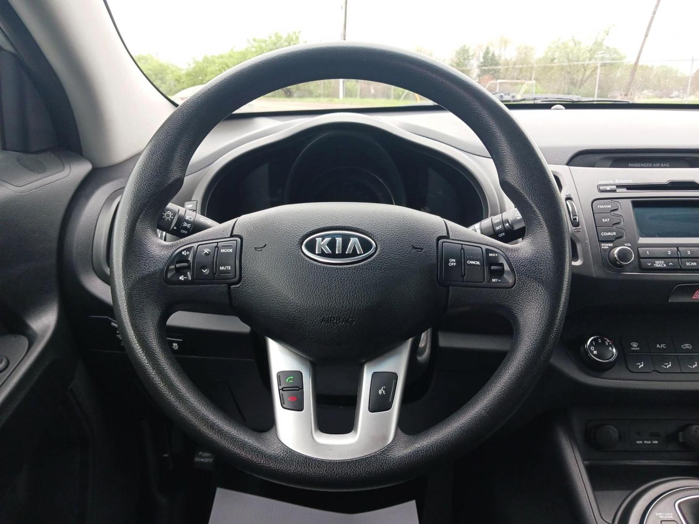 2012 Bright Silver Kia Sportage (KNDPBCA29C7) with an 2.4L V6 DOHC 24V engine, 6-Speed Automatic transmission, located at 1099 N County Rd 25A, Troy, OH, 45373, (937) 908-9800, 40.057079, -84.212883 - Photo#15