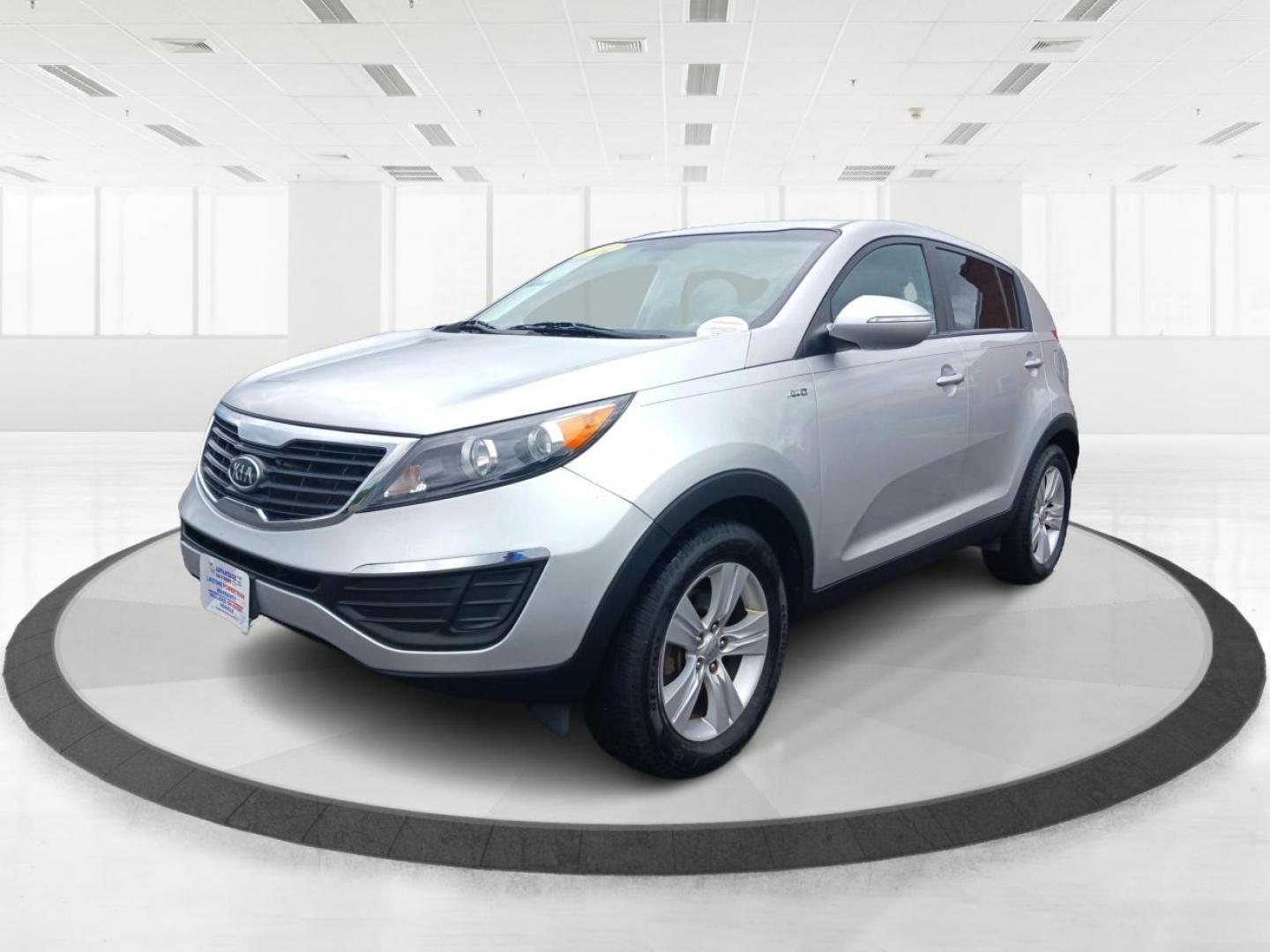 2012 Bright Silver Kia Sportage (KNDPBCA29C7) with an 2.4L V6 DOHC 24V engine, 6-Speed Automatic transmission, located at 1099 N County Rd 25A, Troy, OH, 45373, (937) 908-9800, 40.057079, -84.212883 - Photo#7