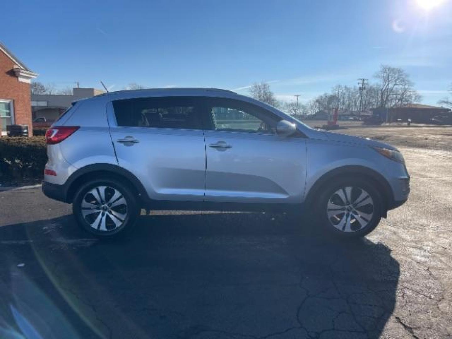 2012 Bright Silver Kia Sportage EX FWD (KNDPC3A29C7) with an 2.4L V6 DOHC 24V engine, 6-Speed Automatic transmission, located at 880 E. National Road, Vandalia, OH, 45377, (937) 908-9800, 39.891918, -84.183594 - Photo#2