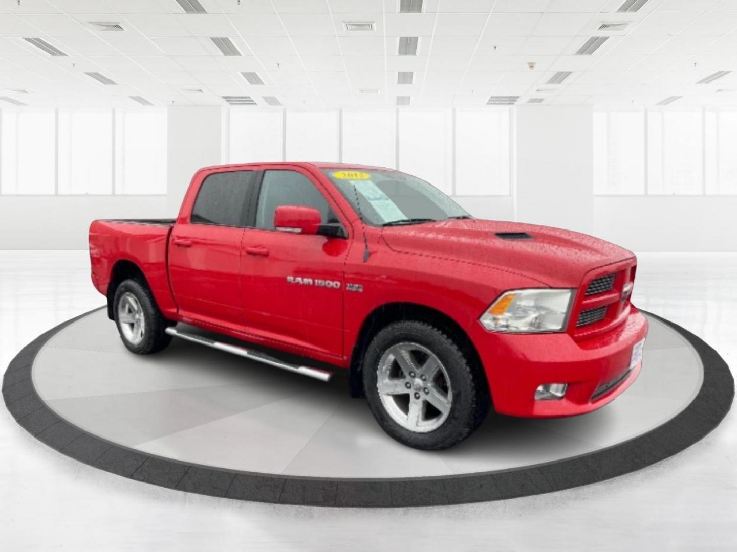 2012 Flame Red RAM 1500 (1C6RD7MT9CS) with an 5.7L V8 OHV 16V engine, 6-Speed Automatic transmission, located at 1099 N County Rd 25A, Troy, OH, 45373, (937) 908-9800, 40.057079, -84.212883 - Photo#0