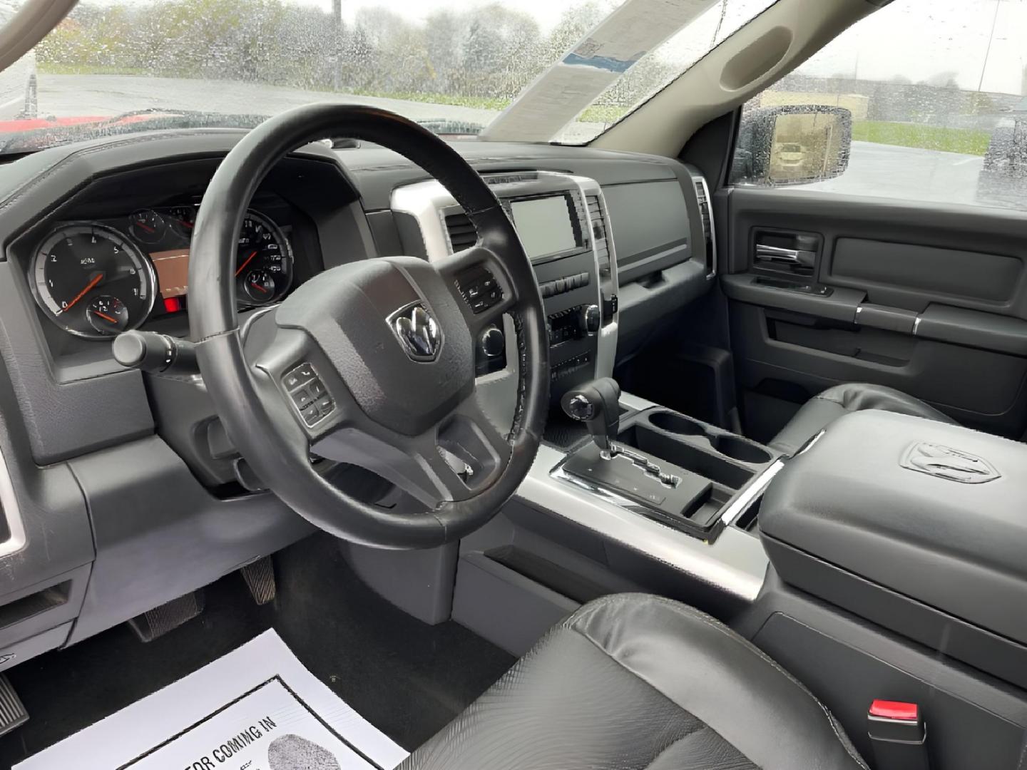 2012 Flame Red RAM 1500 (1C6RD7MT9CS) with an 5.7L V8 OHV 16V engine, 6-Speed Automatic transmission, located at 1099 N County Rd 25A, Troy, OH, 45373, (937) 908-9800, 40.057079, -84.212883 - Photo#6