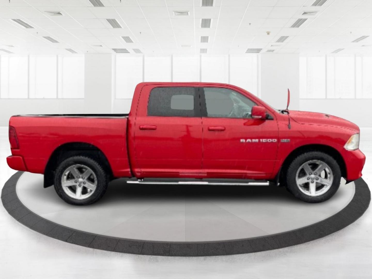 2012 Flame Red RAM 1500 (1C6RD7MT9CS) with an 5.7L V8 OHV 16V engine, 6-Speed Automatic transmission, located at 1099 N County Rd 25A, Troy, OH, 45373, (937) 908-9800, 40.057079, -84.212883 - Photo#1