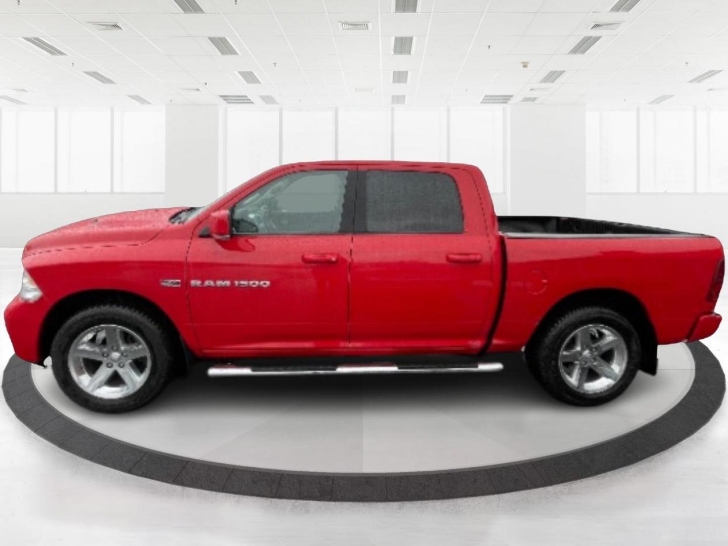 2012 Flame Red RAM 1500 (1C6RD7MT9CS) with an 5.7L V8 OHV 16V engine, 6-Speed Automatic transmission, located at 1099 N County Rd 25A, Troy, OH, 45373, (937) 908-9800, 40.057079, -84.212883 - Photo#3