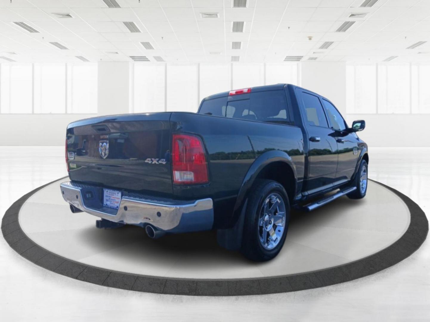 2012 Black Dodge Ram 1500 Laramie Longhorn Edition Crew Cab 4WD (1C6RD7PT6CS) with an 5.7L V8 OHV 16V engine, 6-Speed Automatic transmission, located at 401 Woodman Dr, Riverside, OH, 45431, (937) 908-9800, 39.760899, -84.123421 - Photo#2