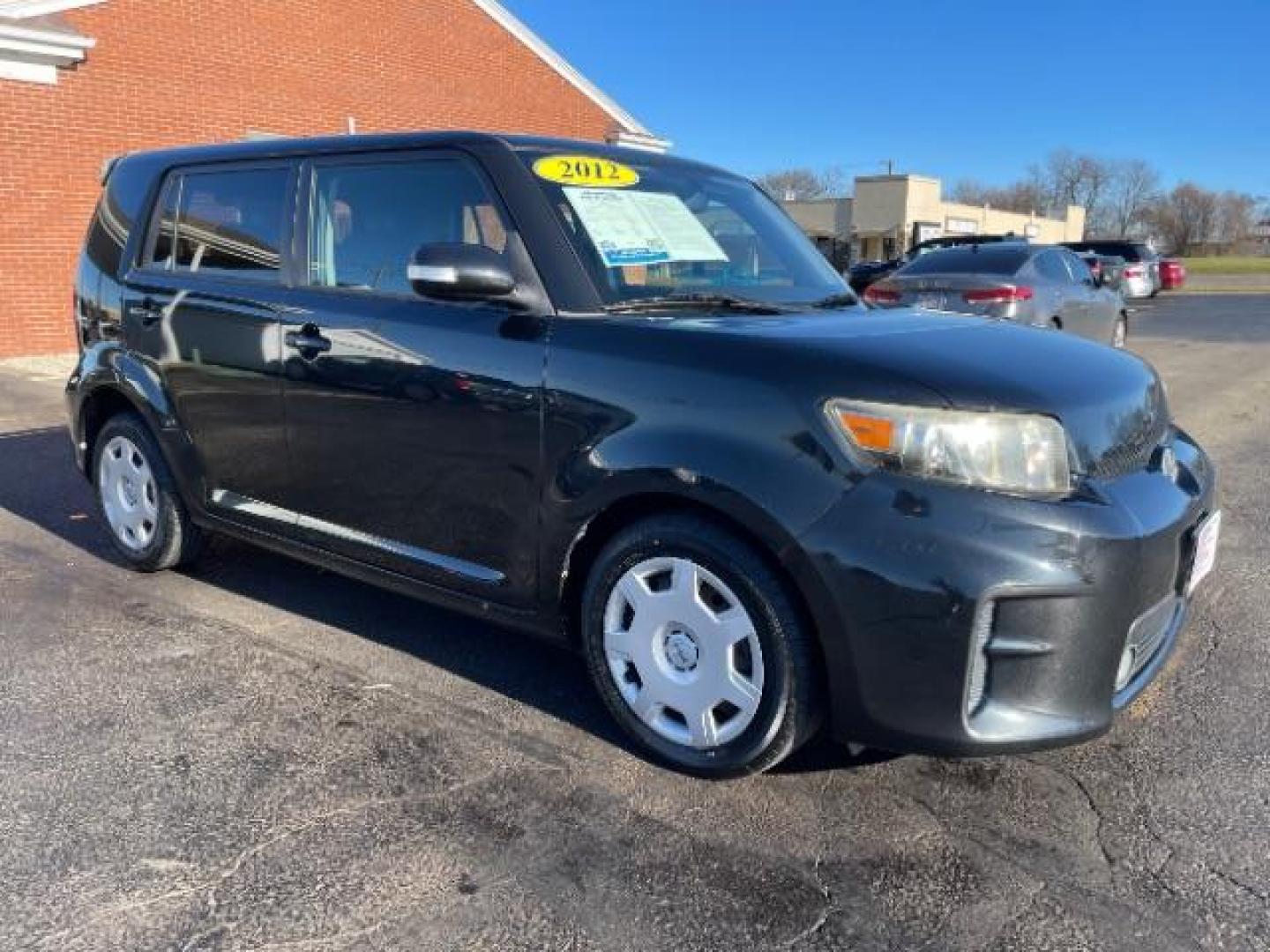 2012 Black Scion xB 5-Door Wagon 4-Spd AT (JTLZE4FE9CJ) with an 2.4L L4 DOHC 16V engine, 4-Speed Automatic transmission, located at 1099 N County Rd 25A, Troy, OH, 45373, (937) 908-9800, 40.057079, -84.212883 - Photo#0