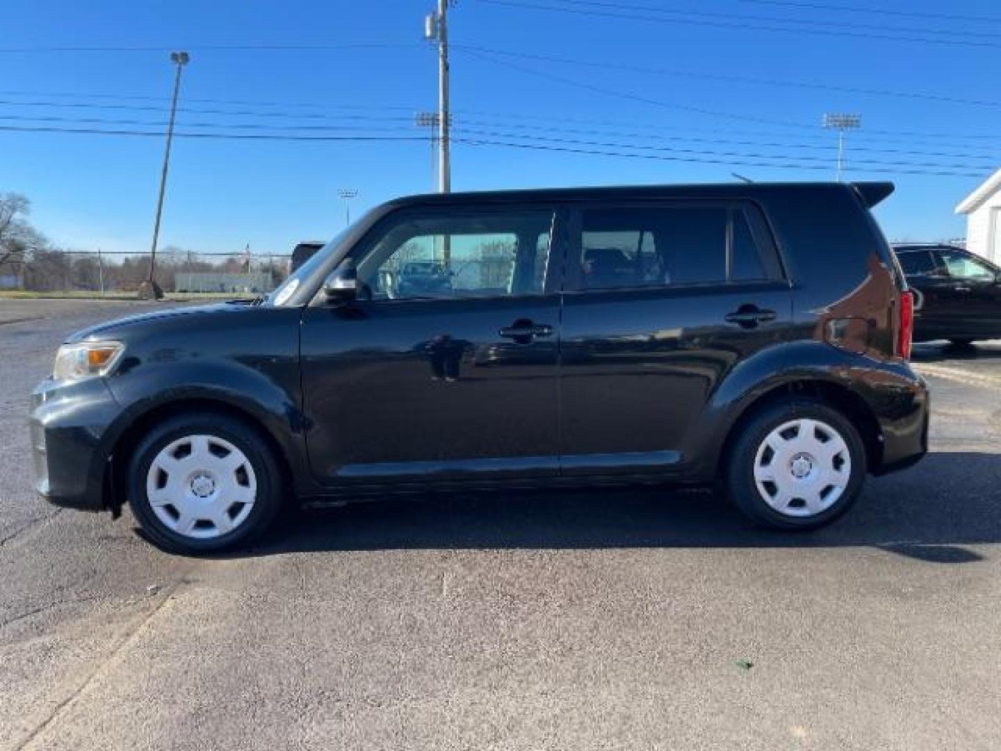 2012 Black Scion xB 5-Door Wagon 4-Spd AT (JTLZE4FE9CJ) with an 2.4L L4 DOHC 16V engine, 4-Speed Automatic transmission, located at 1099 N County Rd 25A, Troy, OH, 45373, (937) 908-9800, 40.057079, -84.212883 - Photo#4