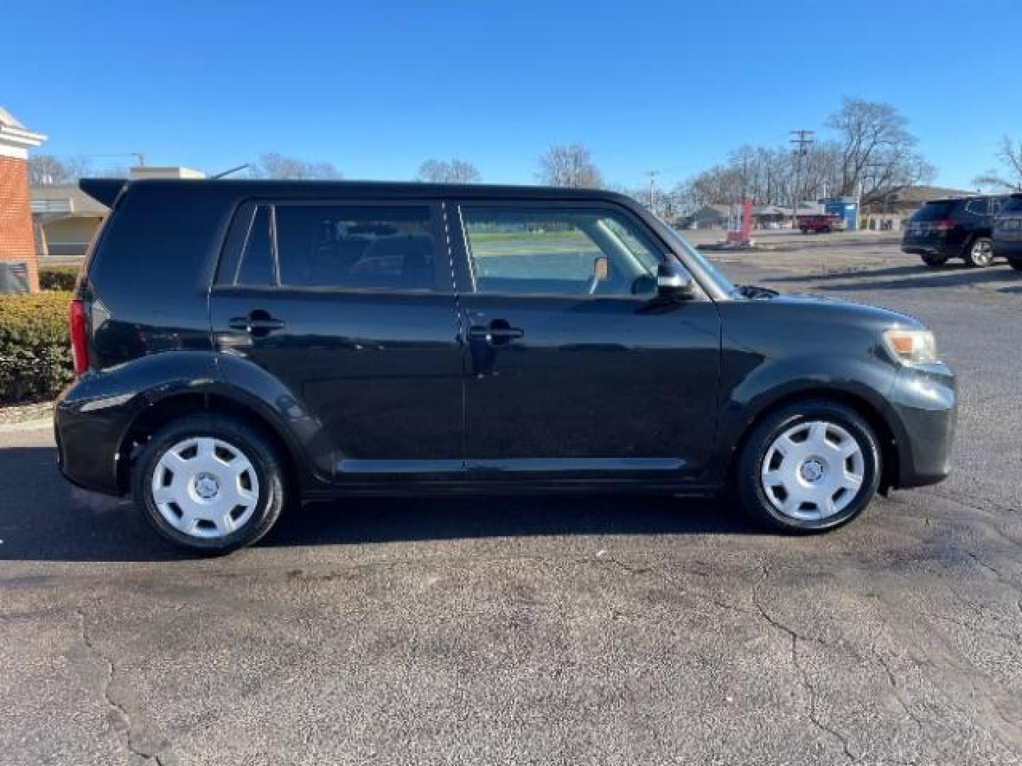 2012 Black Scion xB 5-Door Wagon 4-Spd AT (JTLZE4FE9CJ) with an 2.4L L4 DOHC 16V engine, 4-Speed Automatic transmission, located at 1099 N County Rd 25A, Troy, OH, 45373, (937) 908-9800, 40.057079, -84.212883 - Photo#5