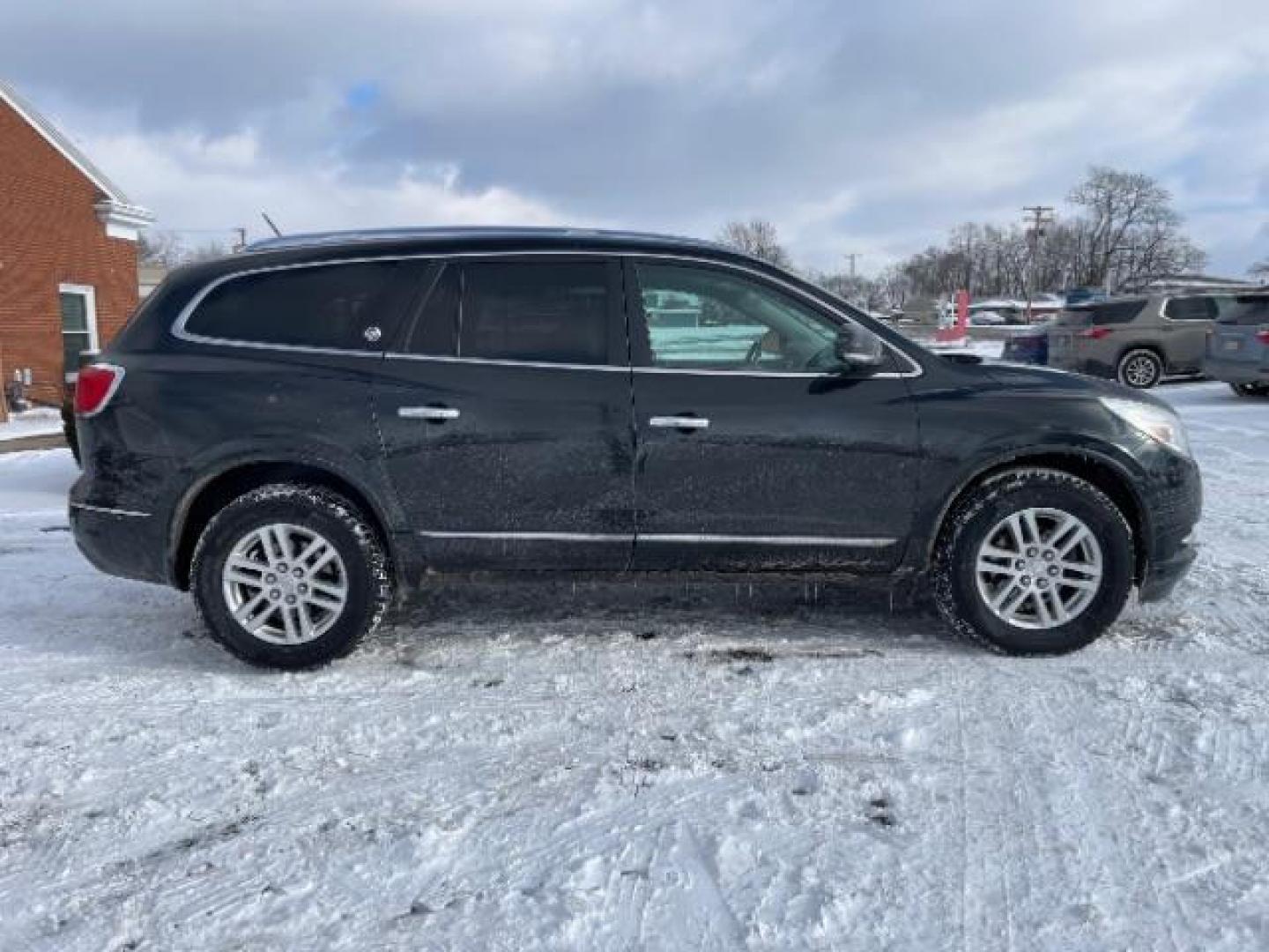 2013 Carbon Black Metallic Buick Enclave Convenience FWD (5GAKRBKD0DJ) with an 3.6L V6 DOHC 24V engine, 6-Speed Automatic Overdrive transmission, located at 1184 Kauffman Ave, Fairborn, OH, 45324, (937) 908-9800, 39.807072, -84.030914 - Photo#5