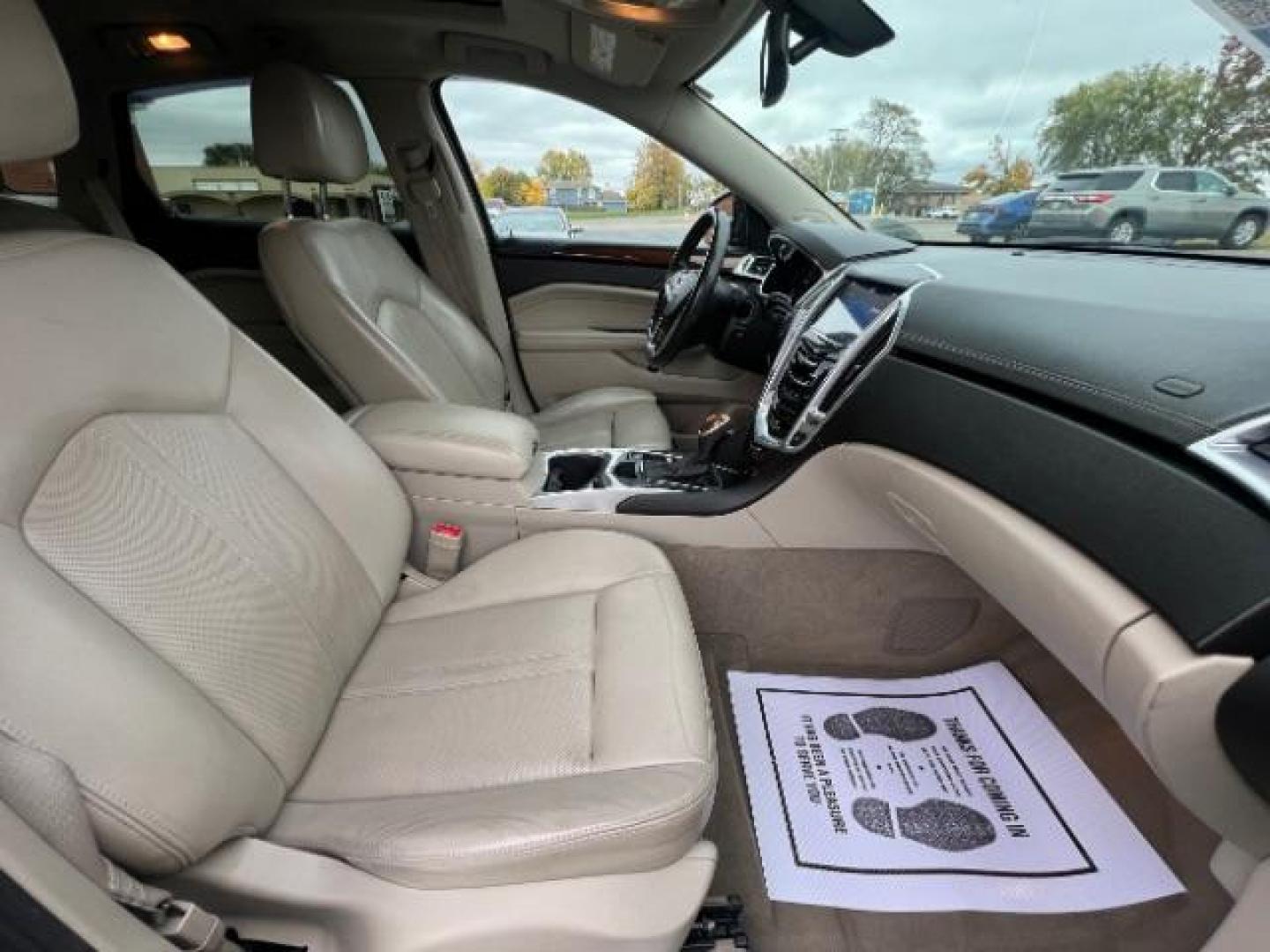 2013 Black Raven Cadillac SRX AWD Luxury Collection (3GYFNGE36DS) with an 3.6L V6 DOHC 24V FFV engine, 6-Speed Automatic transmission, located at 1099 N County Rd 25A, Troy, OH, 45373, (937) 908-9800, 40.057079, -84.212883 - Photo#9