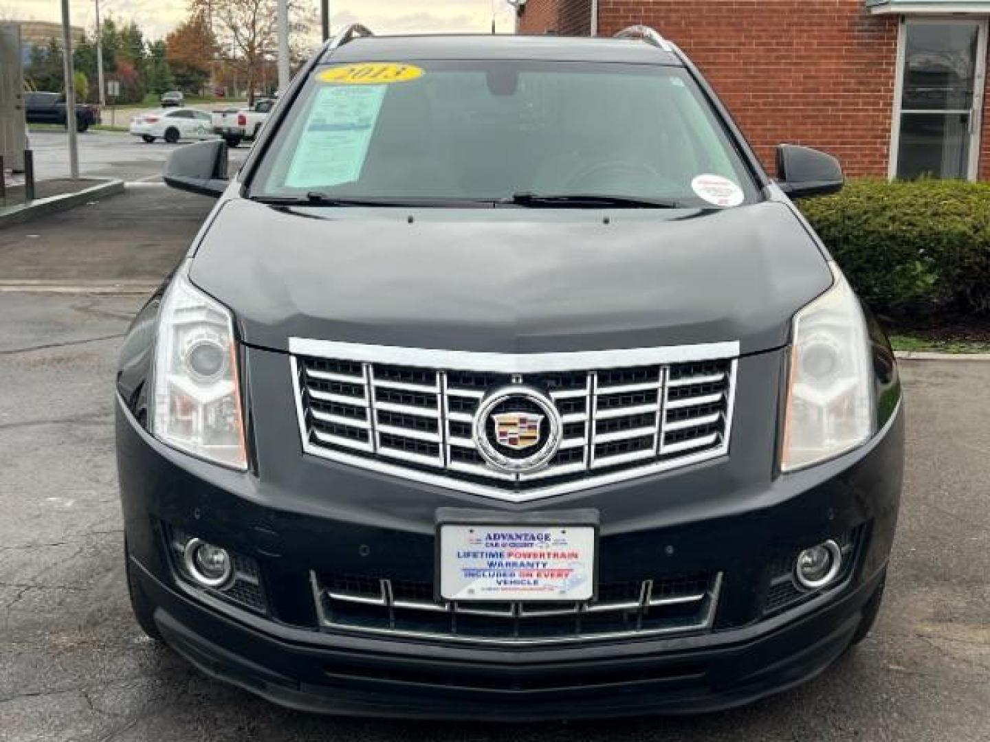 2013 Black Raven Cadillac SRX AWD Luxury Collection (3GYFNGE36DS) with an 3.6L V6 DOHC 24V FFV engine, 6-Speed Automatic transmission, located at 1099 N County Rd 25A, Troy, OH, 45373, (937) 908-9800, 40.057079, -84.212883 - Photo#1