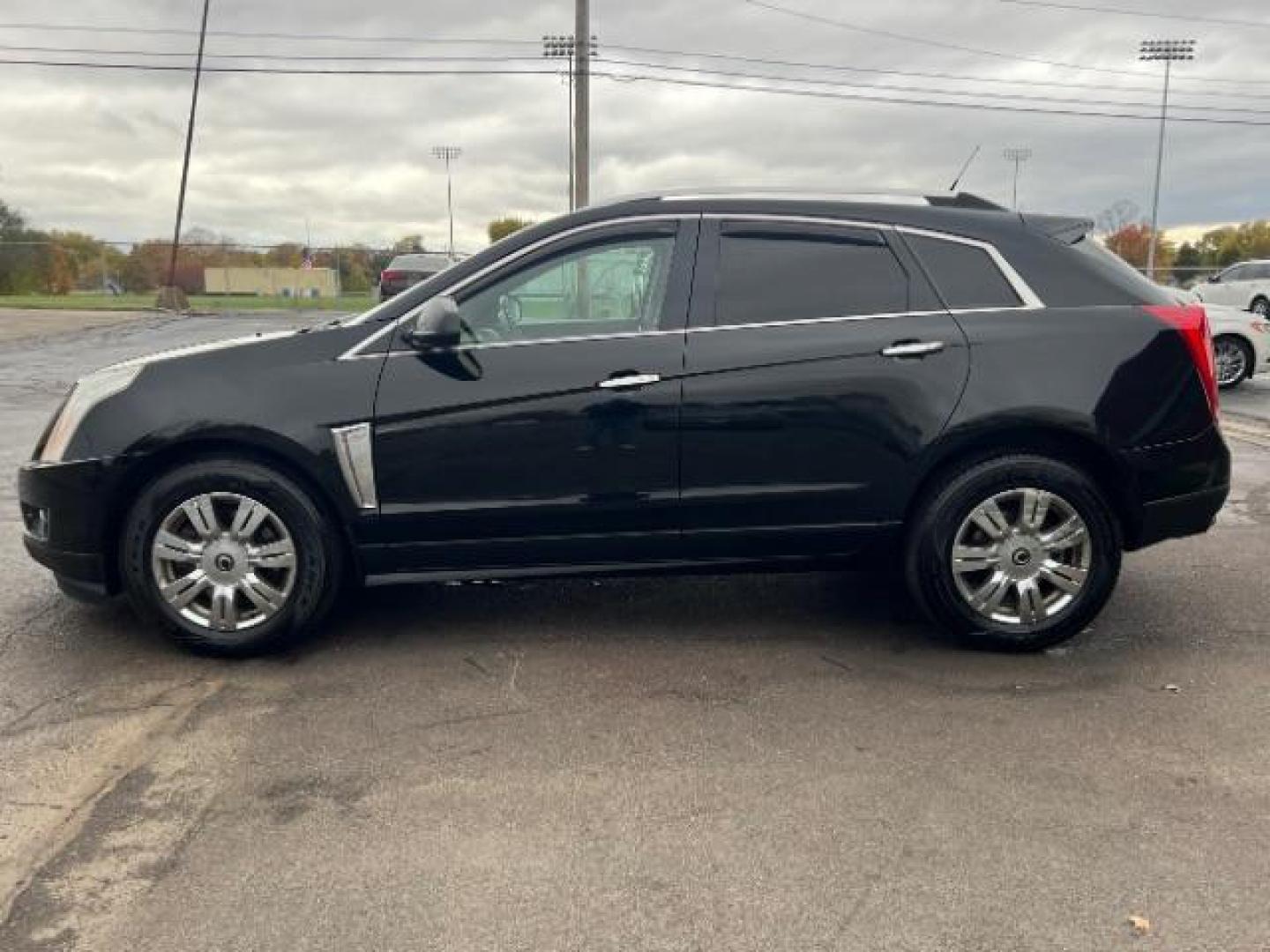 2013 Black Raven Cadillac SRX AWD Luxury Collection (3GYFNGE36DS) with an 3.6L V6 DOHC 24V FFV engine, 6-Speed Automatic transmission, located at 1099 N County Rd 25A, Troy, OH, 45373, (937) 908-9800, 40.057079, -84.212883 - Photo#3