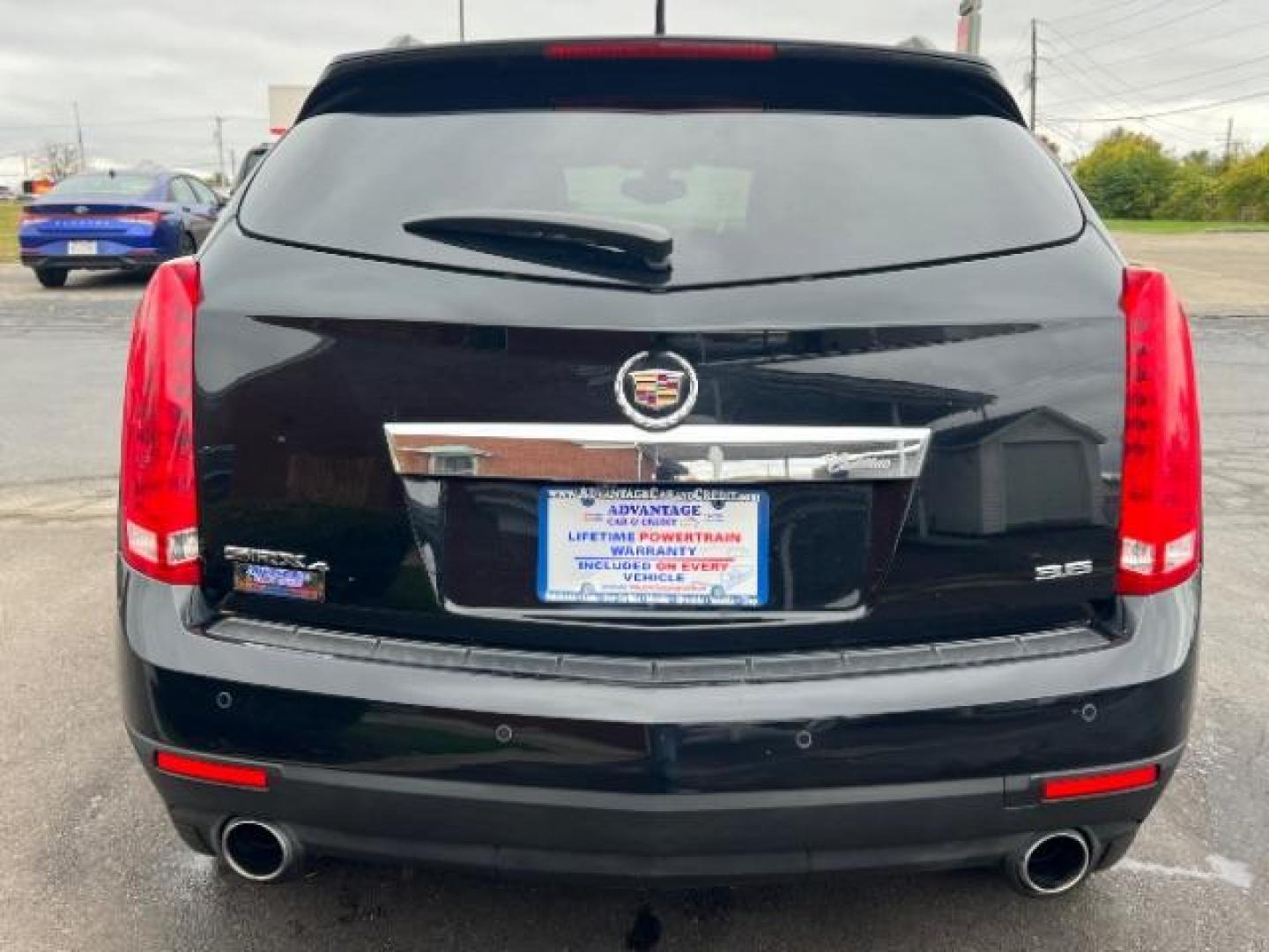 2013 Black Raven Cadillac SRX AWD Luxury Collection (3GYFNGE36DS) with an 3.6L V6 DOHC 24V FFV engine, 6-Speed Automatic transmission, located at 1099 N County Rd 25A, Troy, OH, 45373, (937) 908-9800, 40.057079, -84.212883 - Photo#4