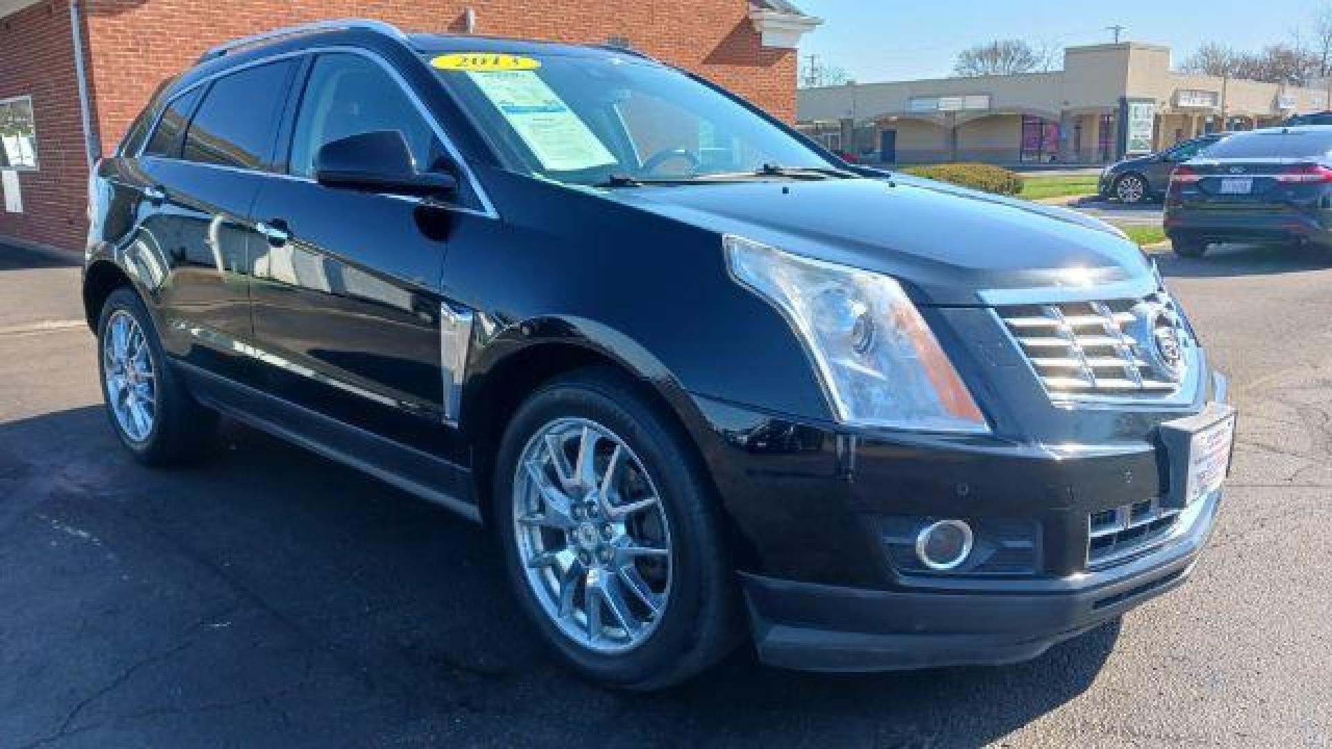 2013 Black Raven Cadillac SRX AWD Performance Collection (3GYFNHE39DS) with an 3.6L V6 DOHC 24V FFV engine, 6-Speed Automatic transmission, located at 1184 Kauffman Ave, Fairborn, OH, 45324, (937) 908-9800, 39.807072, -84.030914 - Photo#0