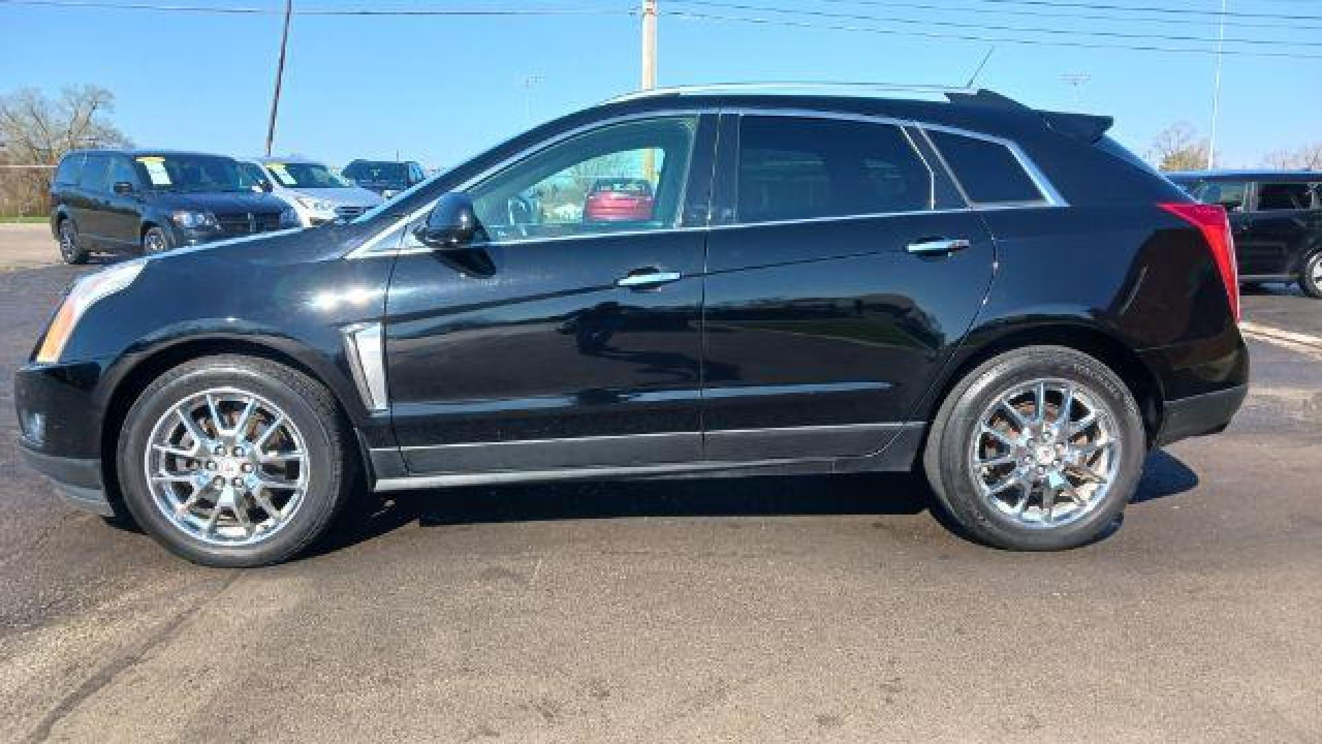 2013 Black Raven Cadillac SRX AWD Performance Collection (3GYFNHE39DS) with an 3.6L V6 DOHC 24V FFV engine, 6-Speed Automatic transmission, located at 1184 Kauffman Ave, Fairborn, OH, 45324, (937) 908-9800, 39.807072, -84.030914 - Photo#4