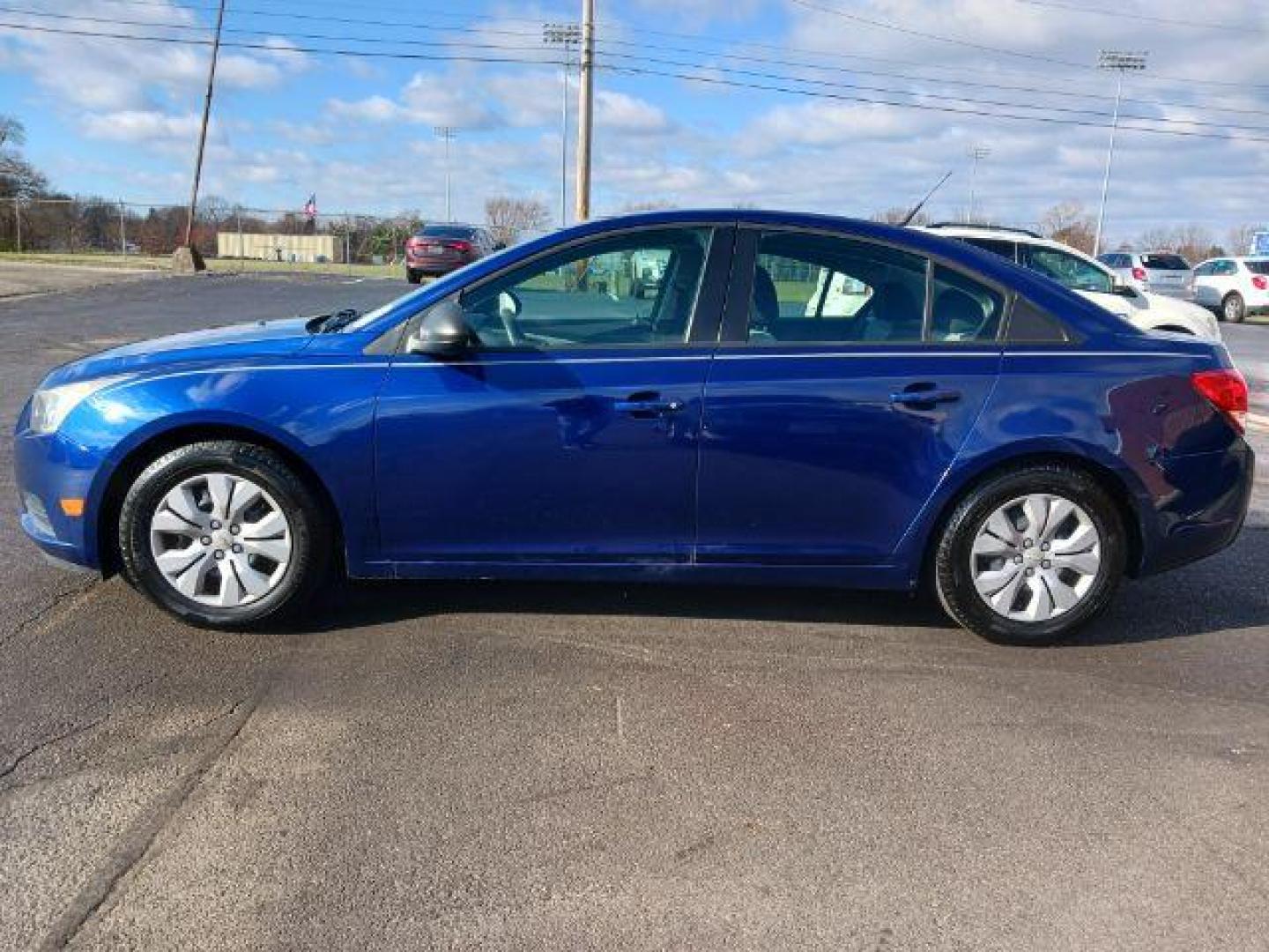 2013 Blue Chevrolet Cruze LS Auto (1G1PA5SH8D7) with an 1.8L L4 DOHC 16V FFV engine, 6-Speed Automatic transmission, located at 401 Woodman Dr, Riverside, OH, 45431, (937) 908-9800, 39.760899, -84.123421 - Photo#3