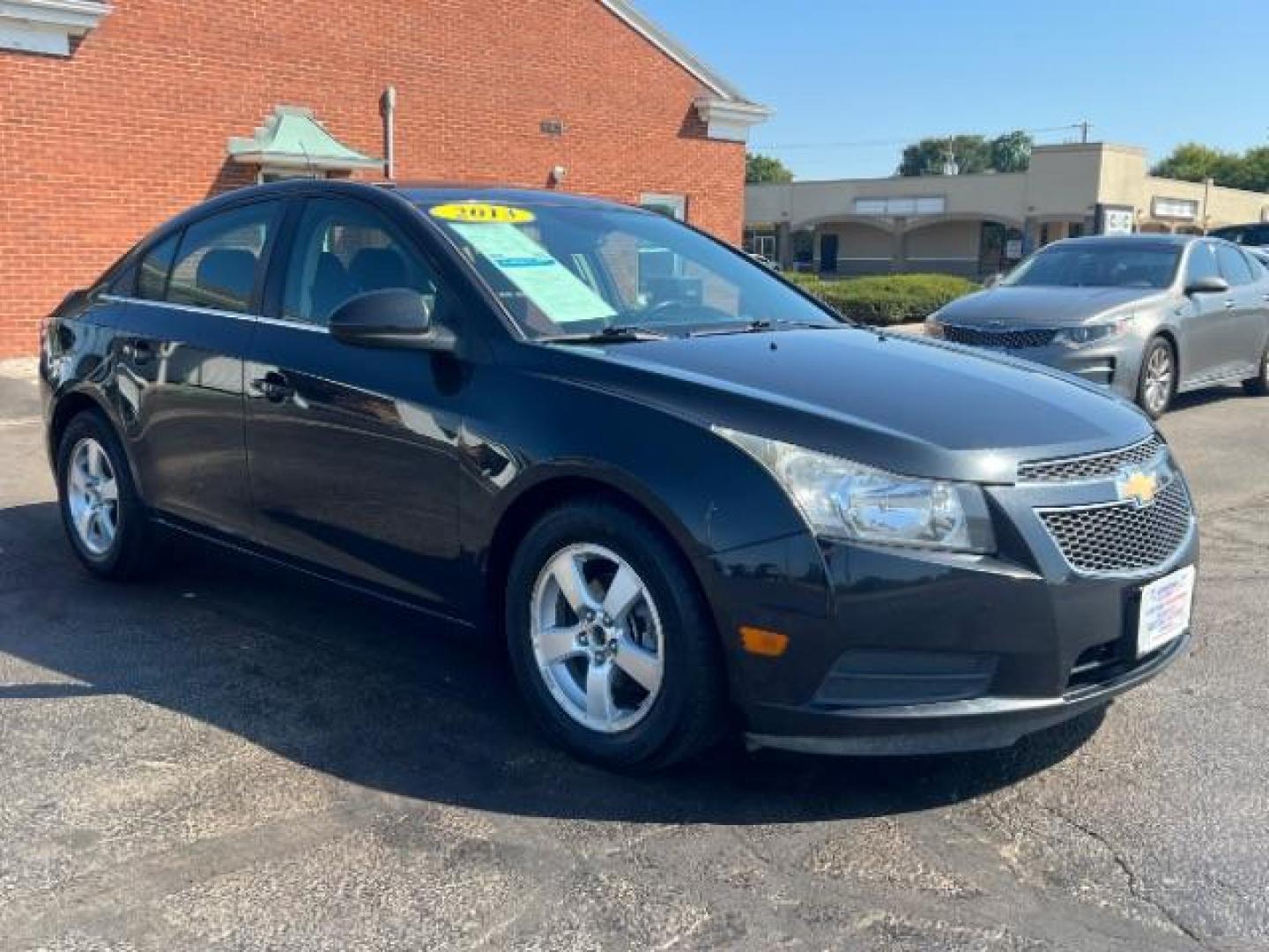 2013 Black Granite Metallic Chevrolet Cruze 1LT Auto (1G1PC5SB1D7) with an 1.4L L4 DOHC 16V TURBO engine, 6-Speed Automatic transmission, located at 4508 South Dixie Dr, Moraine, OH, 45439, (937) 908-9800, 39.689976, -84.218452 - Photo#0