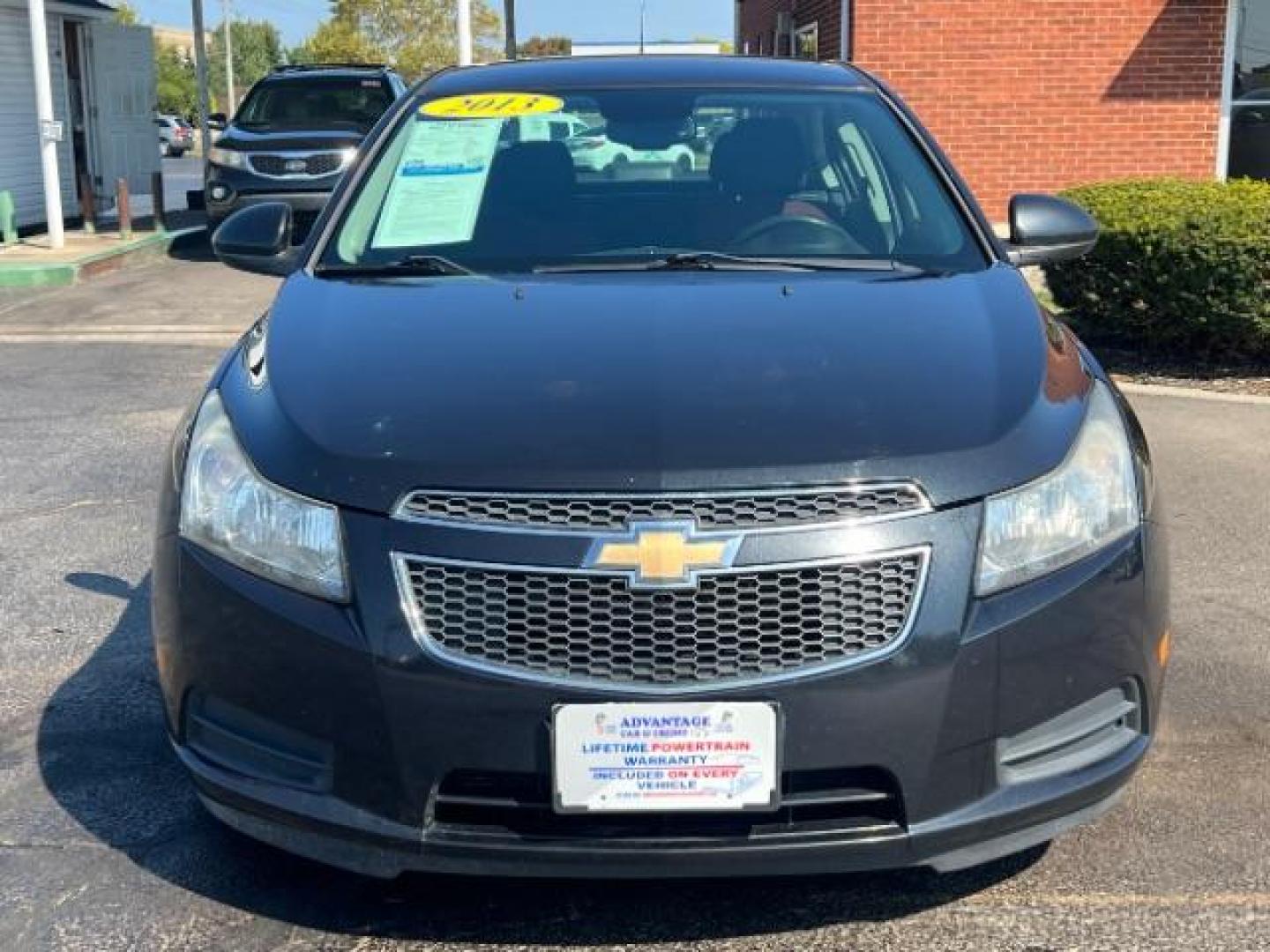 2013 Black Granite Metallic Chevrolet Cruze 1LT Auto (1G1PC5SB1D7) with an 1.4L L4 DOHC 16V TURBO engine, 6-Speed Automatic transmission, located at 4508 South Dixie Dr, Moraine, OH, 45439, (937) 908-9800, 39.689976, -84.218452 - Photo#1