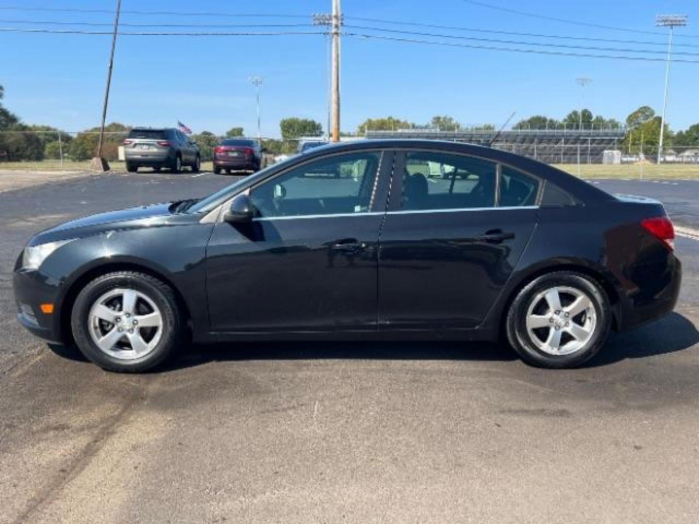 2013 Black Granite Metallic Chevrolet Cruze 1LT Auto (1G1PC5SB1D7) with an 1.4L L4 DOHC 16V TURBO engine, 6-Speed Automatic transmission, located at 4508 South Dixie Dr, Moraine, OH, 45439, (937) 908-9800, 39.689976, -84.218452 - Photo#3