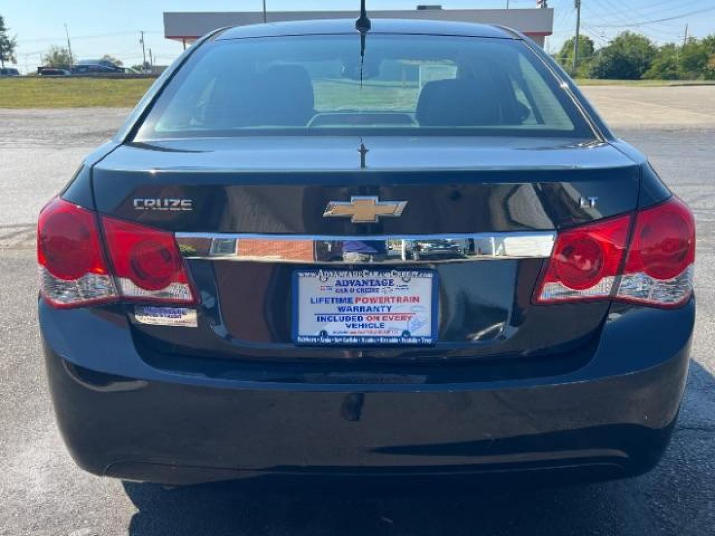 2013 Black Granite Metallic Chevrolet Cruze 1LT Auto (1G1PC5SB1D7) with an 1.4L L4 DOHC 16V TURBO engine, 6-Speed Automatic transmission, located at 4508 South Dixie Dr, Moraine, OH, 45439, (937) 908-9800, 39.689976, -84.218452 - Photo#4