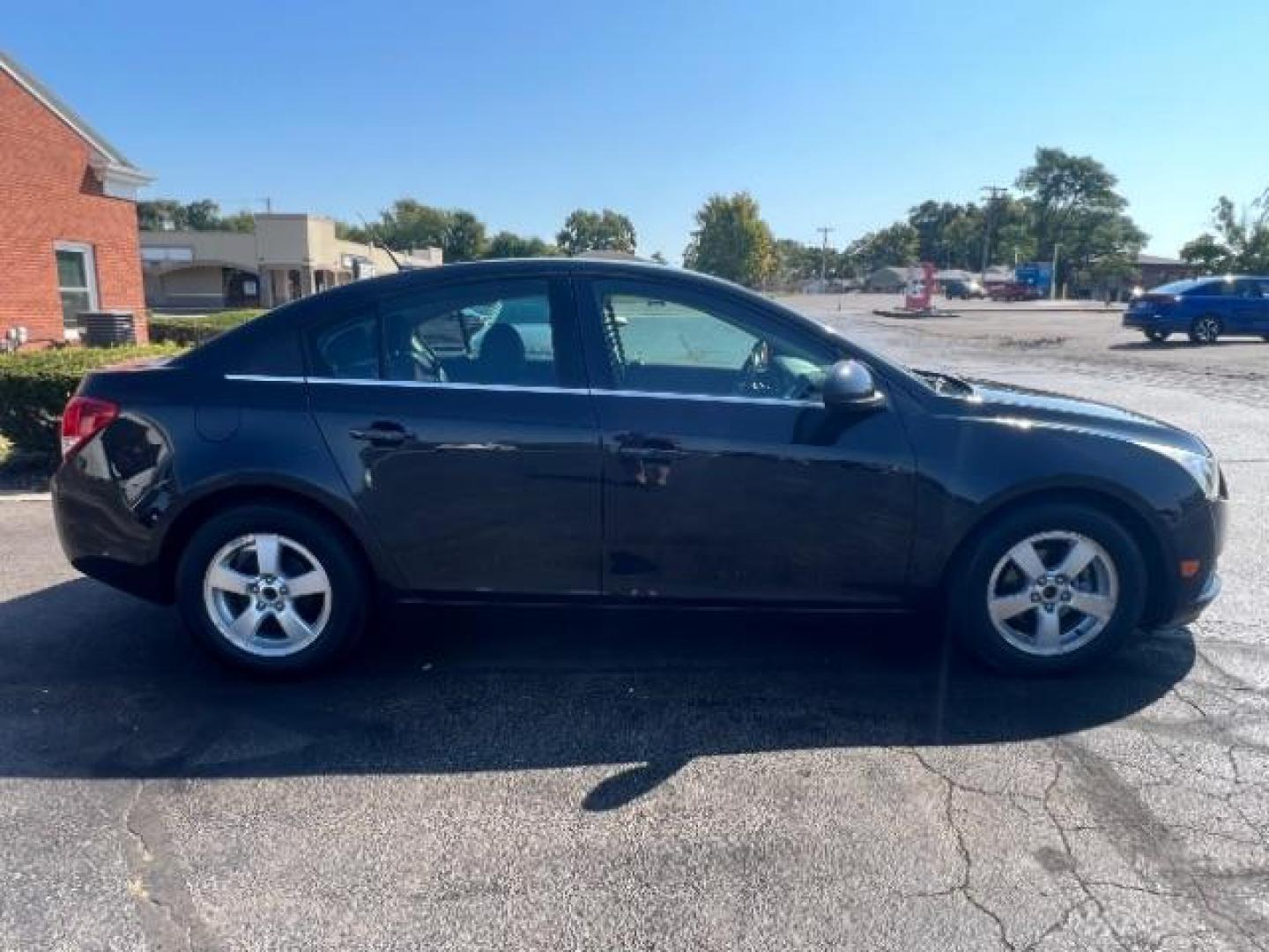 2013 Black Granite Metallic Chevrolet Cruze 1LT Auto (1G1PC5SB1D7) with an 1.4L L4 DOHC 16V TURBO engine, 6-Speed Automatic transmission, located at 4508 South Dixie Dr, Moraine, OH, 45439, (937) 908-9800, 39.689976, -84.218452 - Photo#5