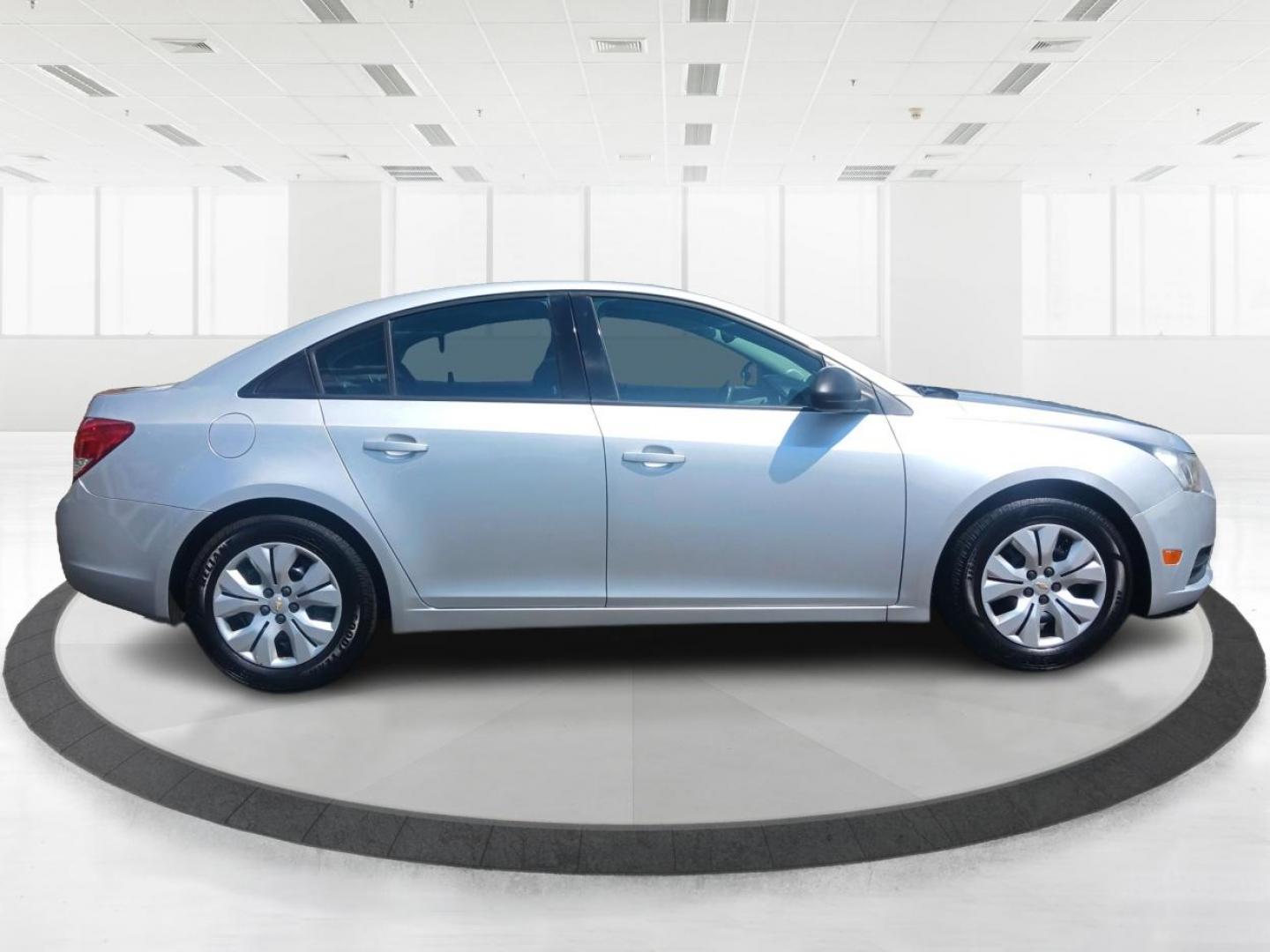 2013 Champagne Silver Metallic Chevrolet Cruze LS Auto (1G1PA5SH8D7) with an 1.8L L4 DOHC 16V FFV engine, 6-Speed Automatic transmission, located at 1184 Kauffman Ave, Fairborn, OH, 45324, (937) 908-9800, 39.807072, -84.030914 - Photo#1