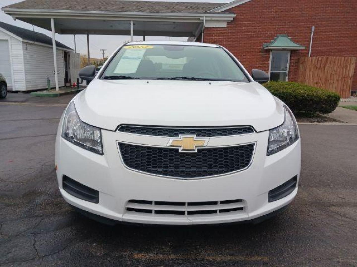 2013 Summit White Chevrolet Cruze LS Auto (1G1PA5SGXD7) with an 1.8L L4 DOHC 16V engine, 6-Speed Automatic transmission, located at 4508 South Dixie Dr, Moraine, OH, 45439, (937) 908-9800, 39.689976, -84.218452 - Photo#1