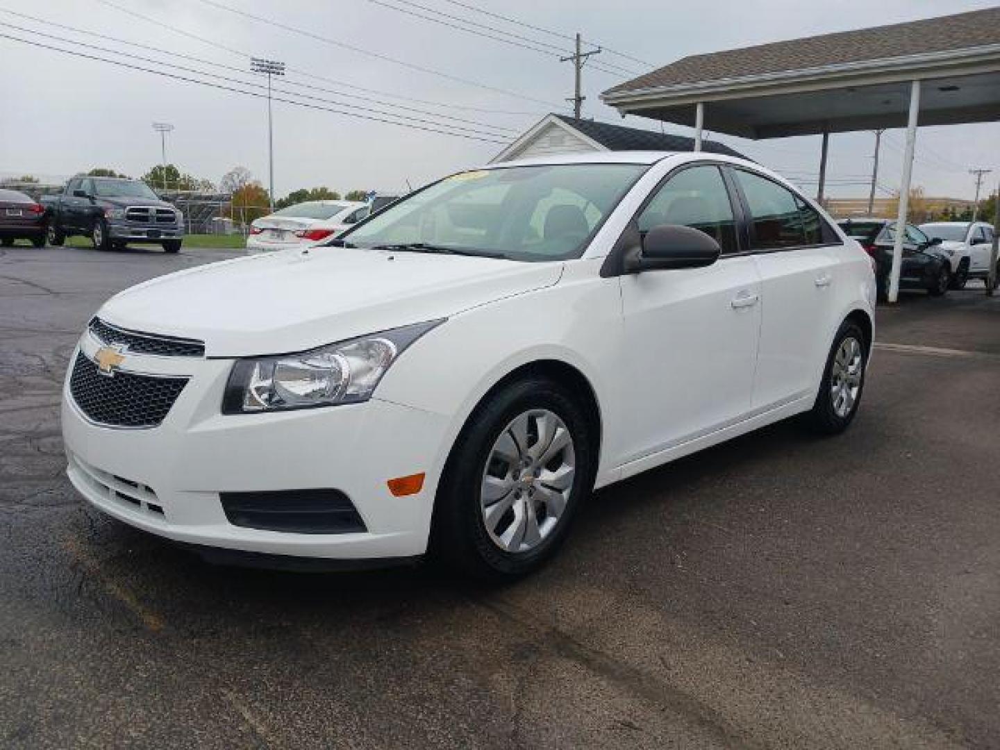 2013 Summit White Chevrolet Cruze LS Auto (1G1PA5SGXD7) with an 1.8L L4 DOHC 16V engine, 6-Speed Automatic transmission, located at 4508 South Dixie Dr, Moraine, OH, 45439, (937) 908-9800, 39.689976, -84.218452 - Photo#2