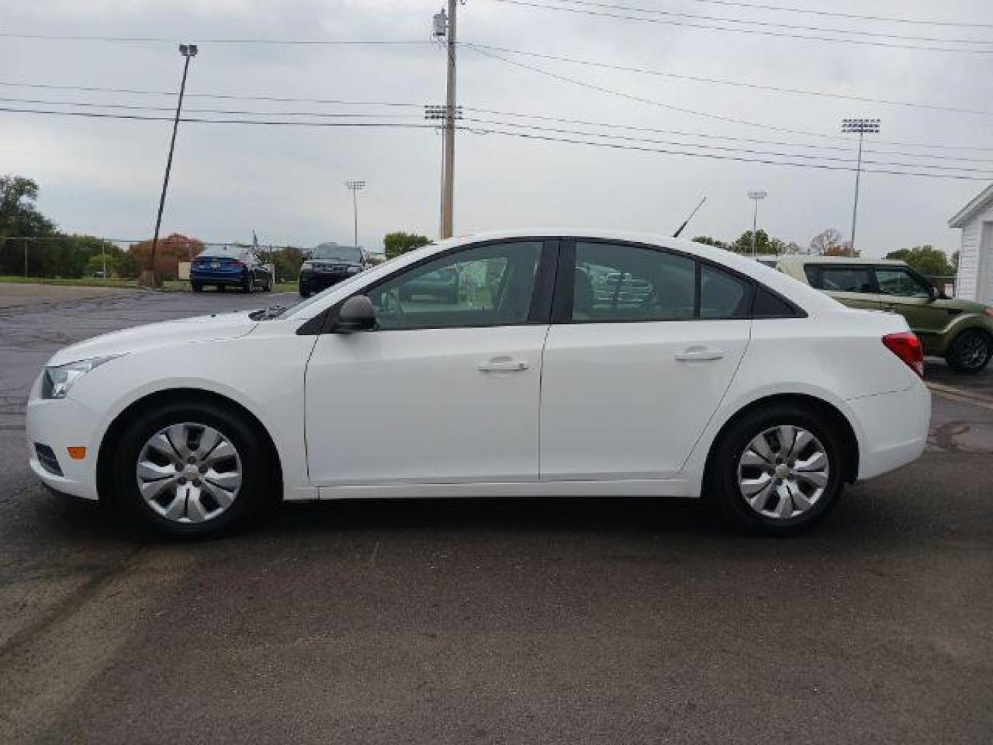 2013 Summit White Chevrolet Cruze LS Auto (1G1PA5SGXD7) with an 1.8L L4 DOHC 16V engine, 6-Speed Automatic transmission, located at 4508 South Dixie Dr, Moraine, OH, 45439, (937) 908-9800, 39.689976, -84.218452 - Photo#3