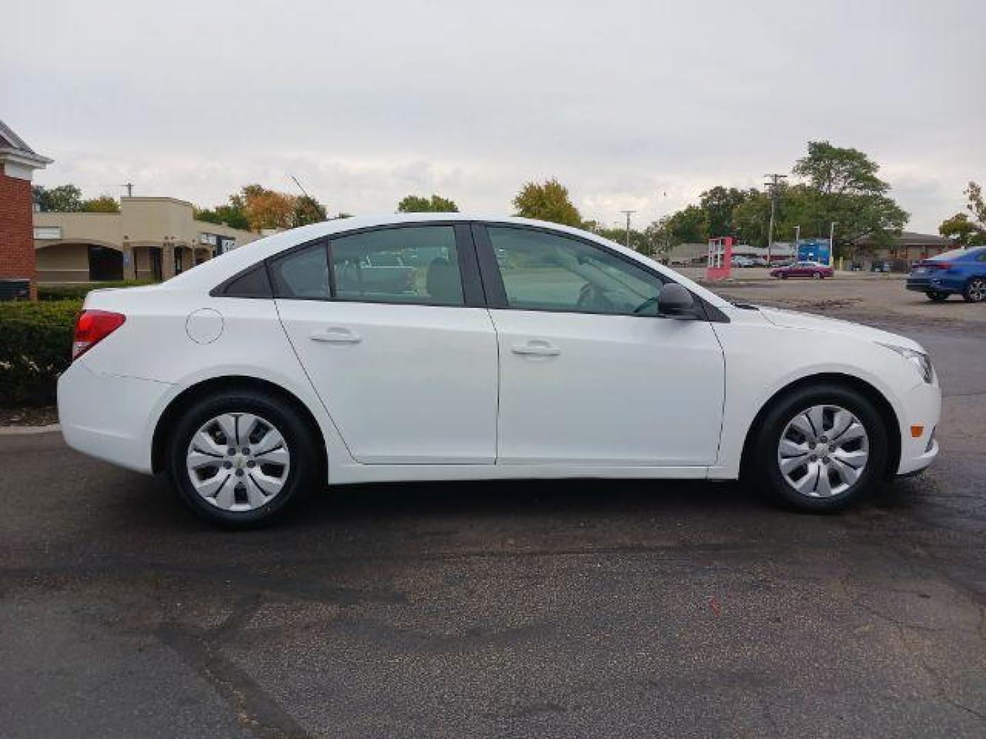 2013 Summit White Chevrolet Cruze LS Auto (1G1PA5SGXD7) with an 1.8L L4 DOHC 16V engine, 6-Speed Automatic transmission, located at 4508 South Dixie Dr, Moraine, OH, 45439, (937) 908-9800, 39.689976, -84.218452 - Photo#4