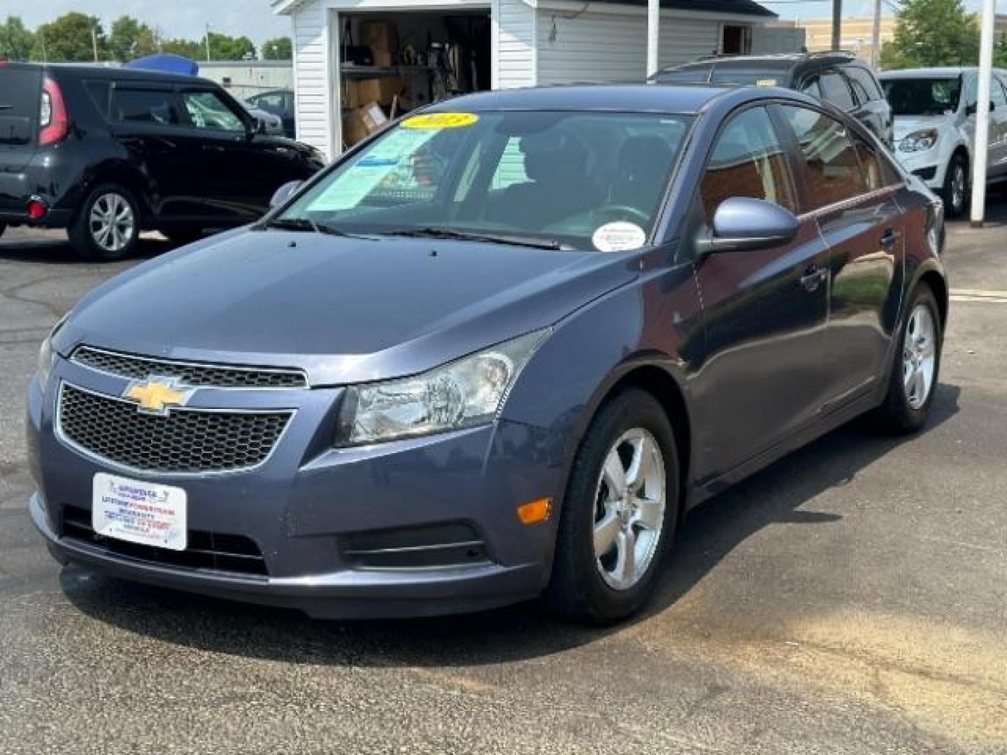 2013 Atlantis Blue Metallic Chevrolet Cruze 1LT Auto (1G1PC5SB3D7) with an 1.4L L4 DOHC 16V TURBO engine, 6-Speed Automatic transmission, located at 1230 East Main St, Xenia, OH, 45385, (937) 908-9800, 39.688026, -83.910172 - Photo#2