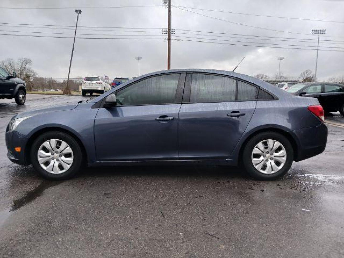 2013 Atlantis Blue Metallic Chevrolet Cruze LS Auto (1G1PA5SG9D7) with an 1.8L L4 DOHC 16V engine, 6-Speed Automatic transmission, located at 4508 South Dixie Dr, Moraine, OH, 45439, (937) 908-9800, 39.689976, -84.218452 - Photo#3