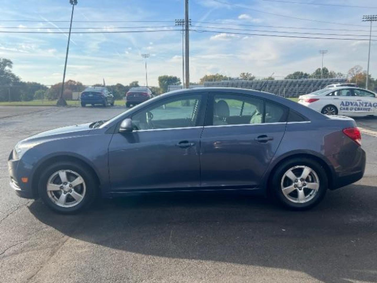 2013 Blue Topaz Metallic Chevrolet Cruze 1LT Auto (1G1PC5SB1D7) with an 1.4L L4 DOHC 16V TURBO engine, 6-Speed Automatic transmission, located at 1230 East Main St, Xenia, OH, 45385, (937) 908-9800, 39.688026, -83.910172 - Photo#3