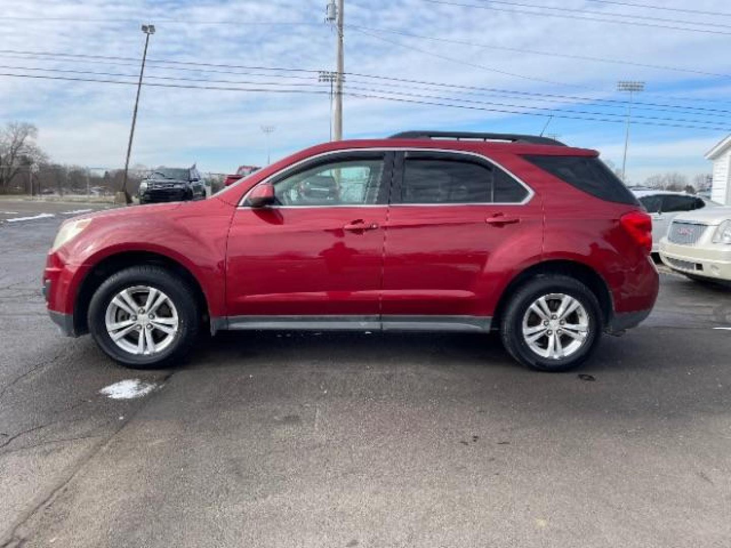 2013 Crystal Red Tintcoat Chevrolet Equinox 1LT AWD (2GNFLEEK4D6) with an 2.4L L4 DOHC 16V engine, 6-Speed Automatic transmission, located at 1184 Kauffman Ave, Fairborn, OH, 45324, (937) 908-9800, 39.807072, -84.030914 - Photo#2