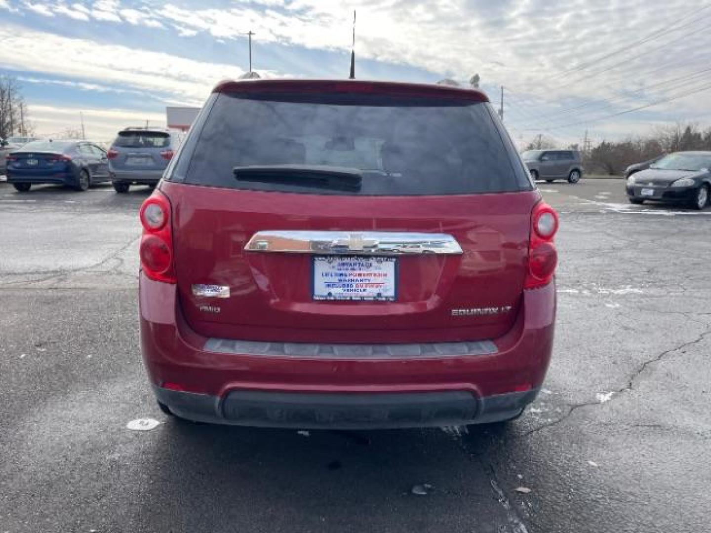 2013 Crystal Red Tintcoat Chevrolet Equinox 1LT AWD (2GNFLEEK4D6) with an 2.4L L4 DOHC 16V engine, 6-Speed Automatic transmission, located at 1184 Kauffman Ave, Fairborn, OH, 45324, (937) 908-9800, 39.807072, -84.030914 - Photo#4