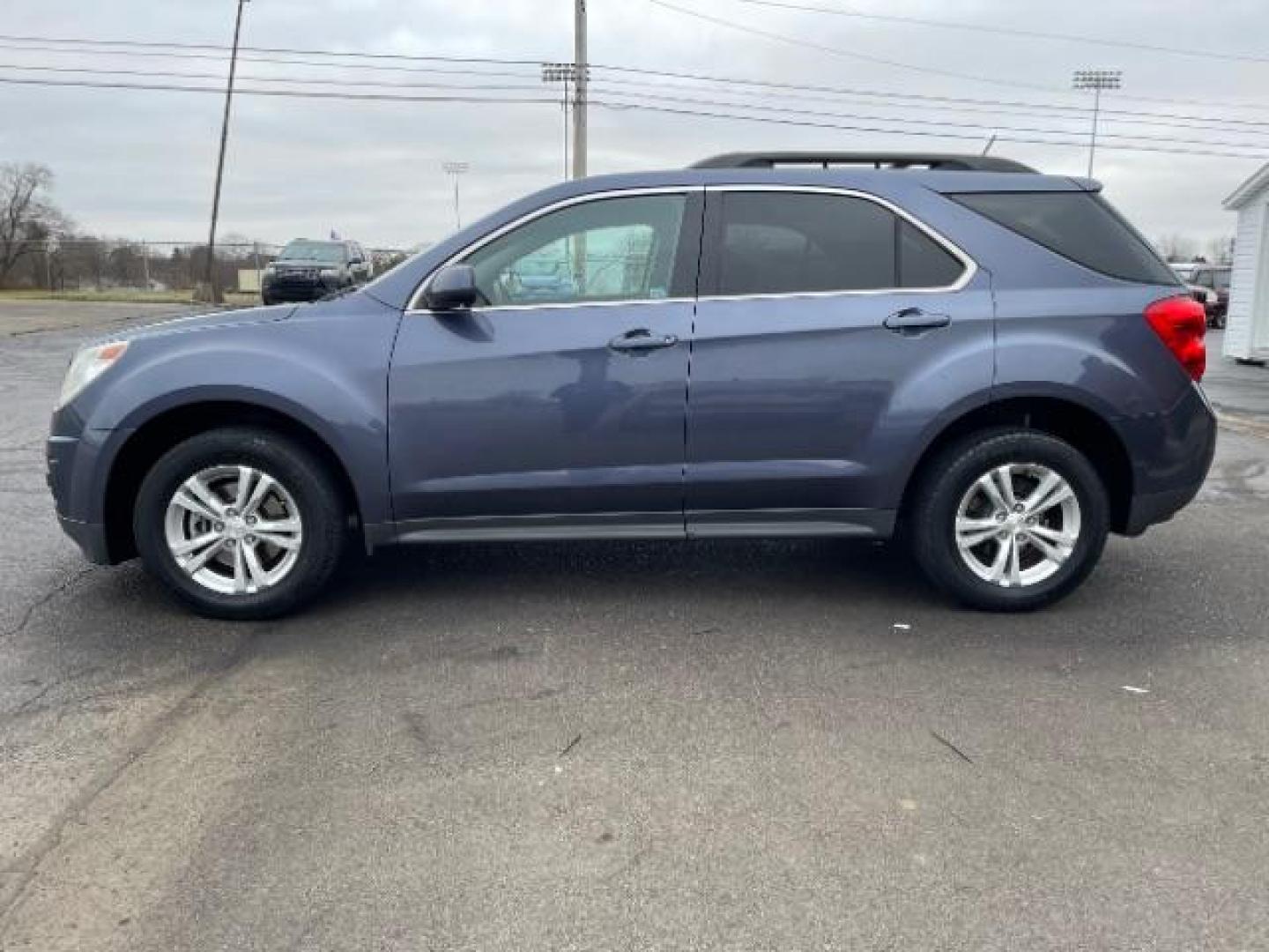 2013 Atlantis Blue Metallic Chevrolet Equinox 1LT AWD (2GNFLEEK2D6) with an 2.4L L4 DOHC 16V engine, 6-Speed Automatic transmission, located at 880 E. National Road, Vandalia, OH, 45377, (937) 908-9800, 39.891918, -84.183594 - Photo#2