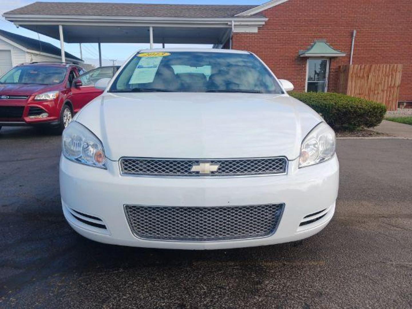 2013 White Chevrolet Impala LT (Fleet) (2G1WG5E34D1) with an 3.6L V6 DOHC 16V FFV engine, 6-Speed Automatic transmission, located at 1951 S Dayton Lakeview Rd., New Carlisle, OH, 45344, (937) 908-9800, 39.890999, -84.050255 - Photo#1